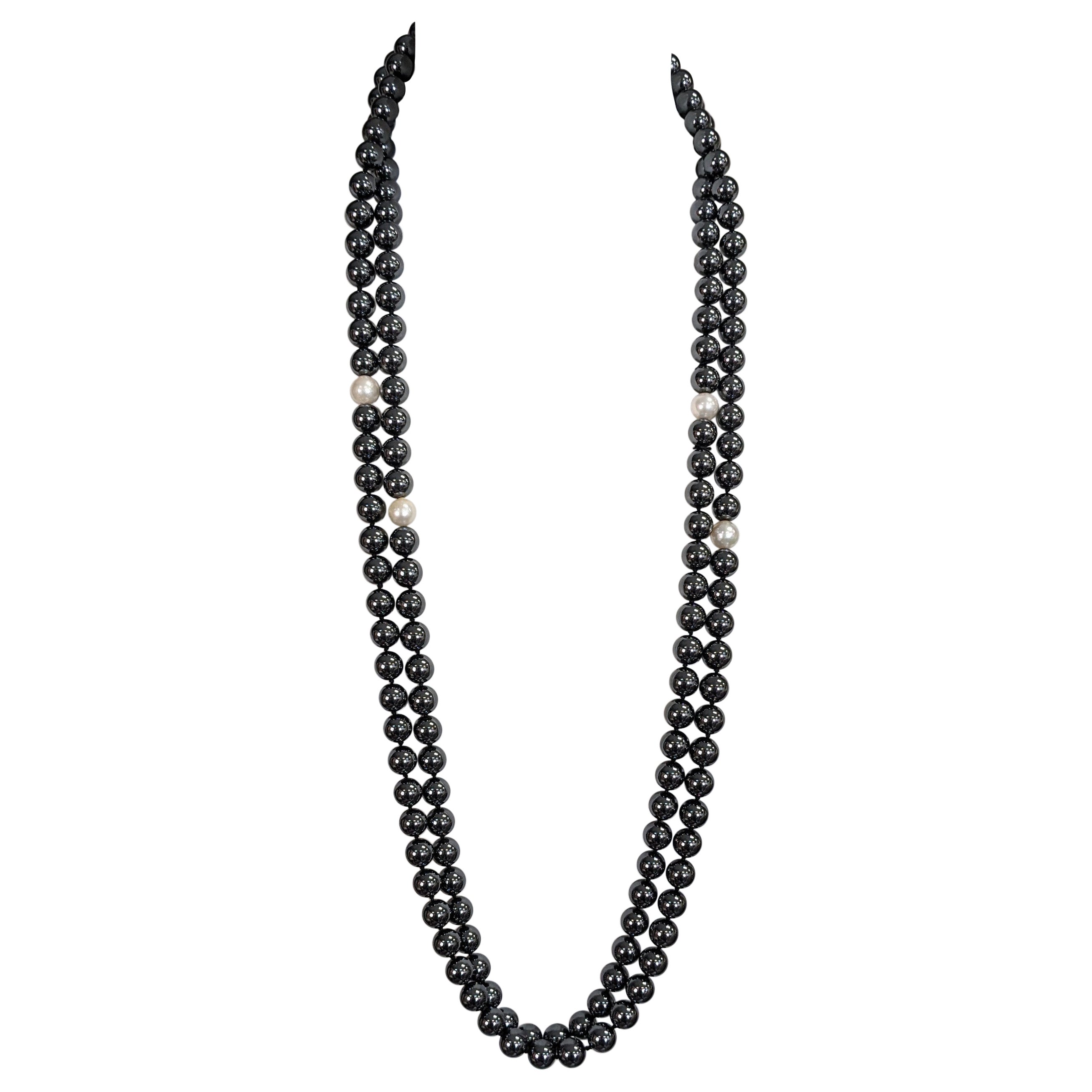 Perline annodate a mano con ematite e perle coltivate in vendita