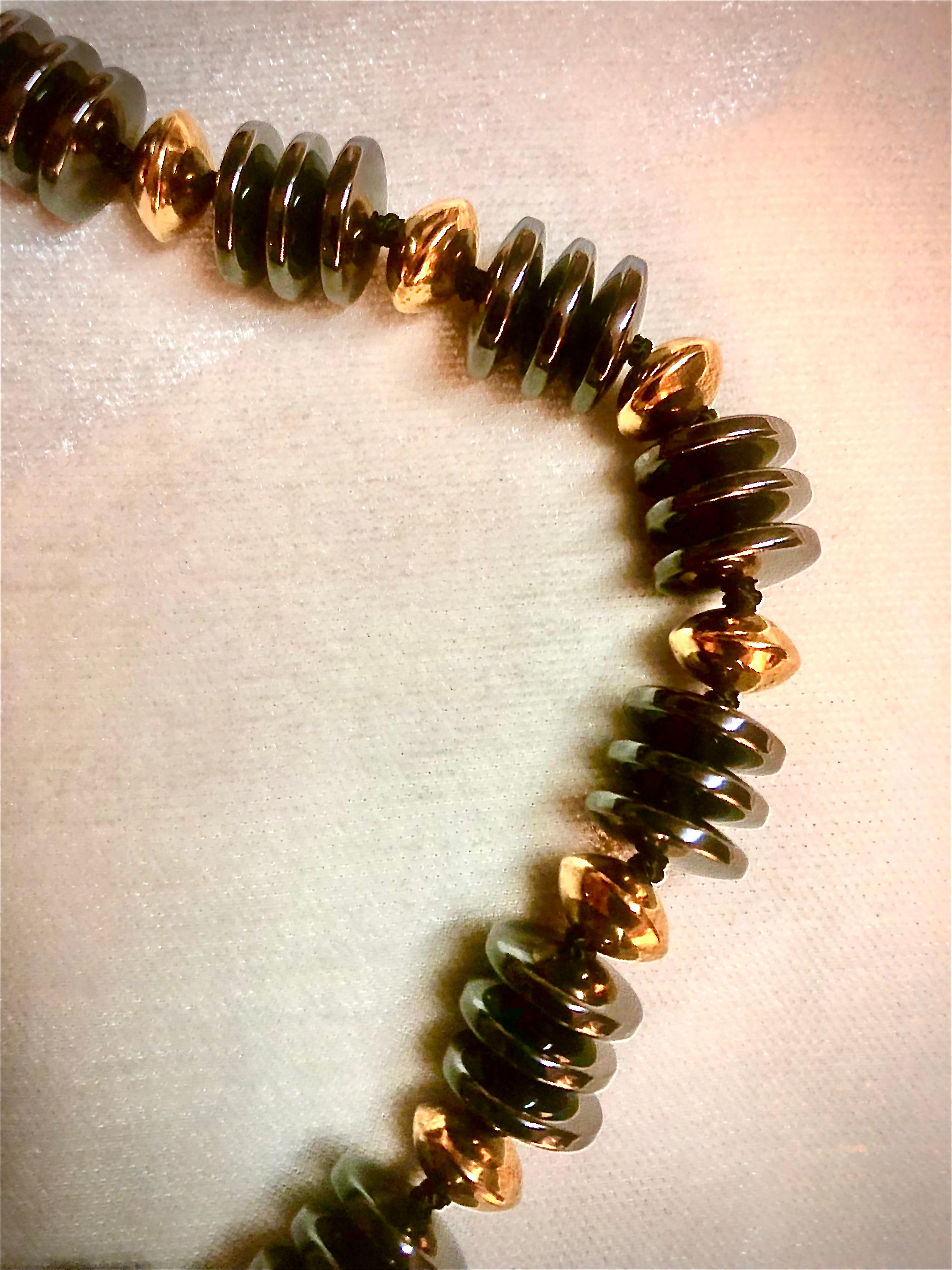 Bead Hematite and gold necklace For Sale