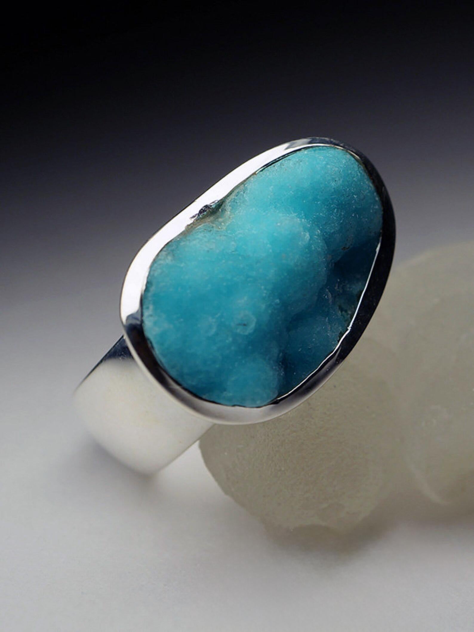 Silver ring with natural Hemimorphite 
gemstone original mining - China
gem size is 0.28 x 0.63 x 0.91 in / 7 x 16 x 23 mm
hemimorphite weight - 20 carat
ring size - 7.75 US
ring weight - 10.49 grams