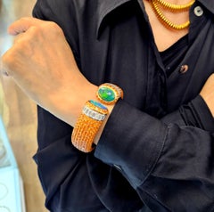 Bracelet manchette Hemmerle en or 18 carats, platine, diamants et opales