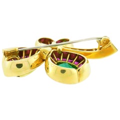 Spilla a clip Hemmerle con smeraldo e trifoglio in oro