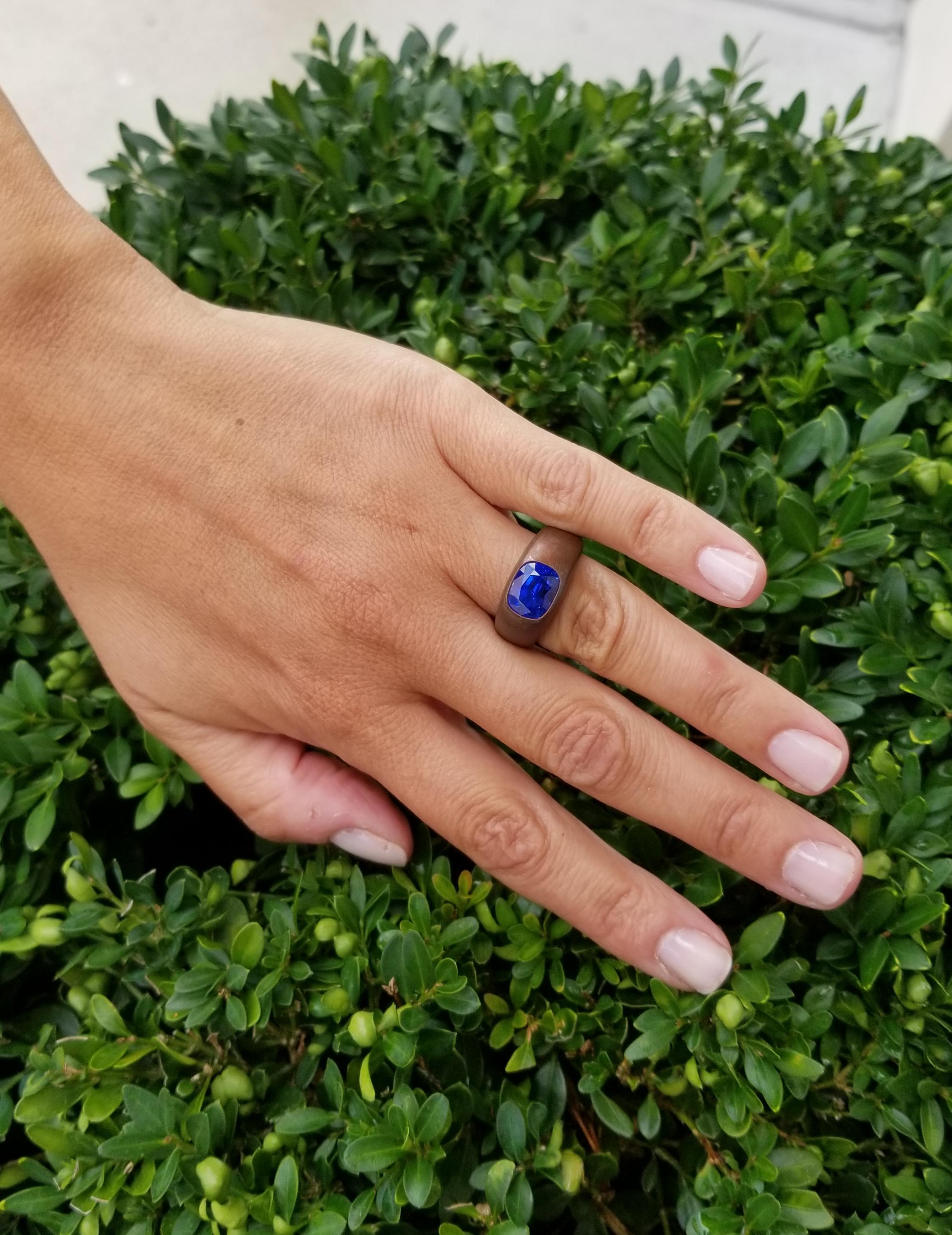 With a luscious combination of velvety blue sapphire and earthy brown copper, this vintage Hemmerle gypsy ring is the perfect marriage of contrasting warm and cool hues.  The antique cushion cut 4.20 carat no heat Ceylon sapphire is burnished set in