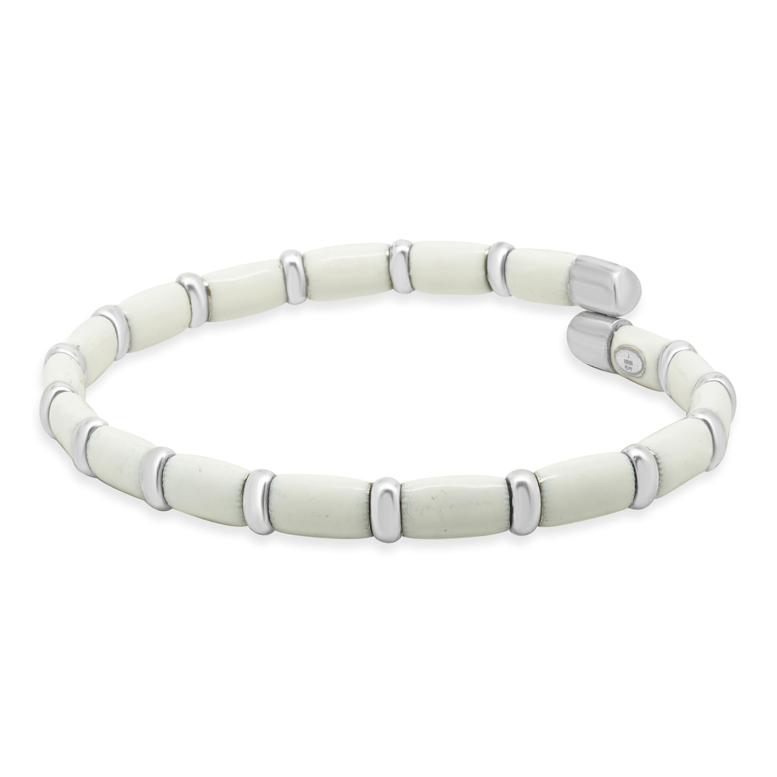 Designer: Henderson Legacy
Material: 18K white gold, sterling silver, white enamel
Dimensions: bracelet will fit a 7-inch wrist
Weight: 15.81 grams