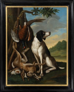 Antique A hound and game in a woodland landscape