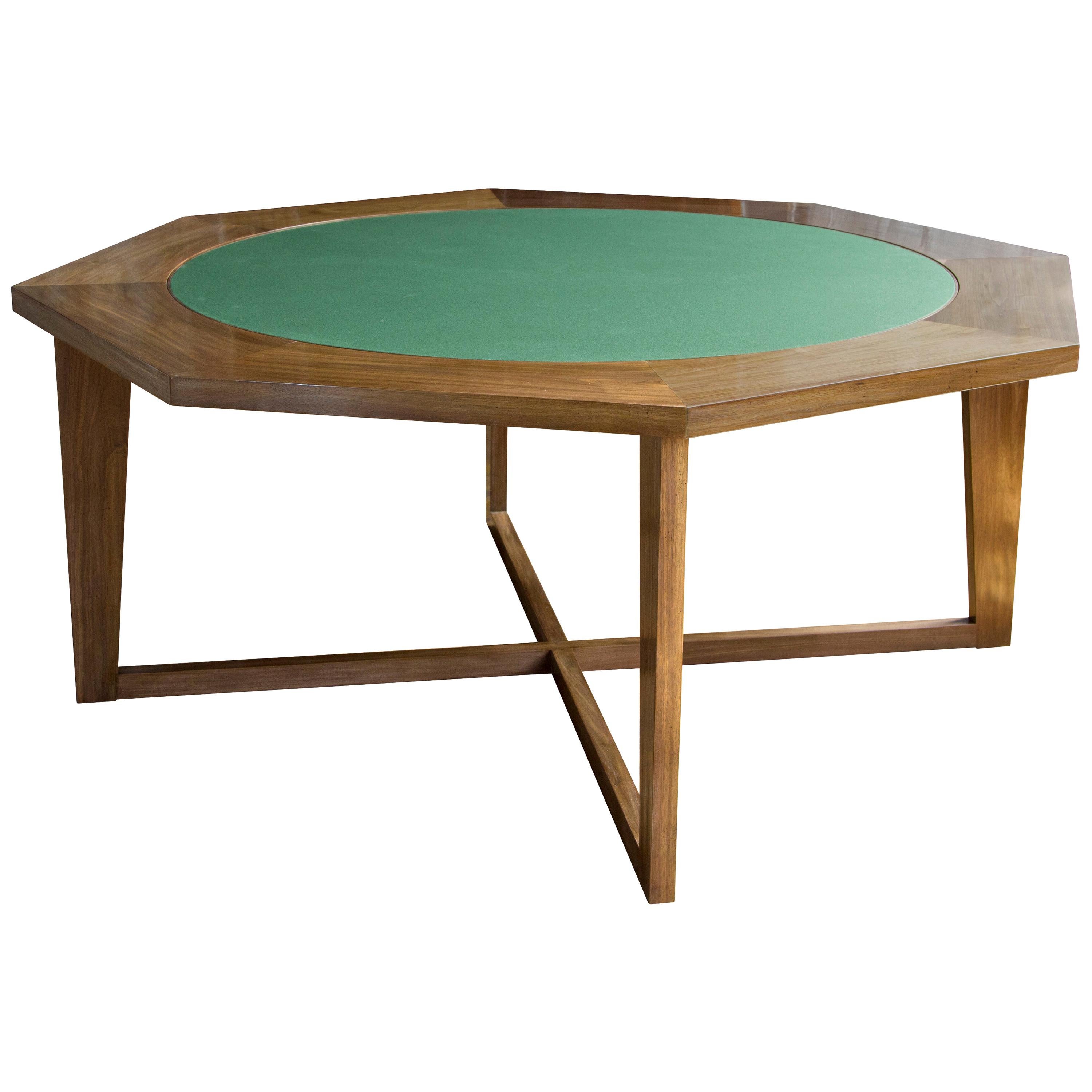 The octagonal Hendricks poker / dining table with revolving inner round in stained mahogany and traditional game table green felt.

The modern campaign collection by Richard Wrightman combines the vernacular of traditional form with a modern