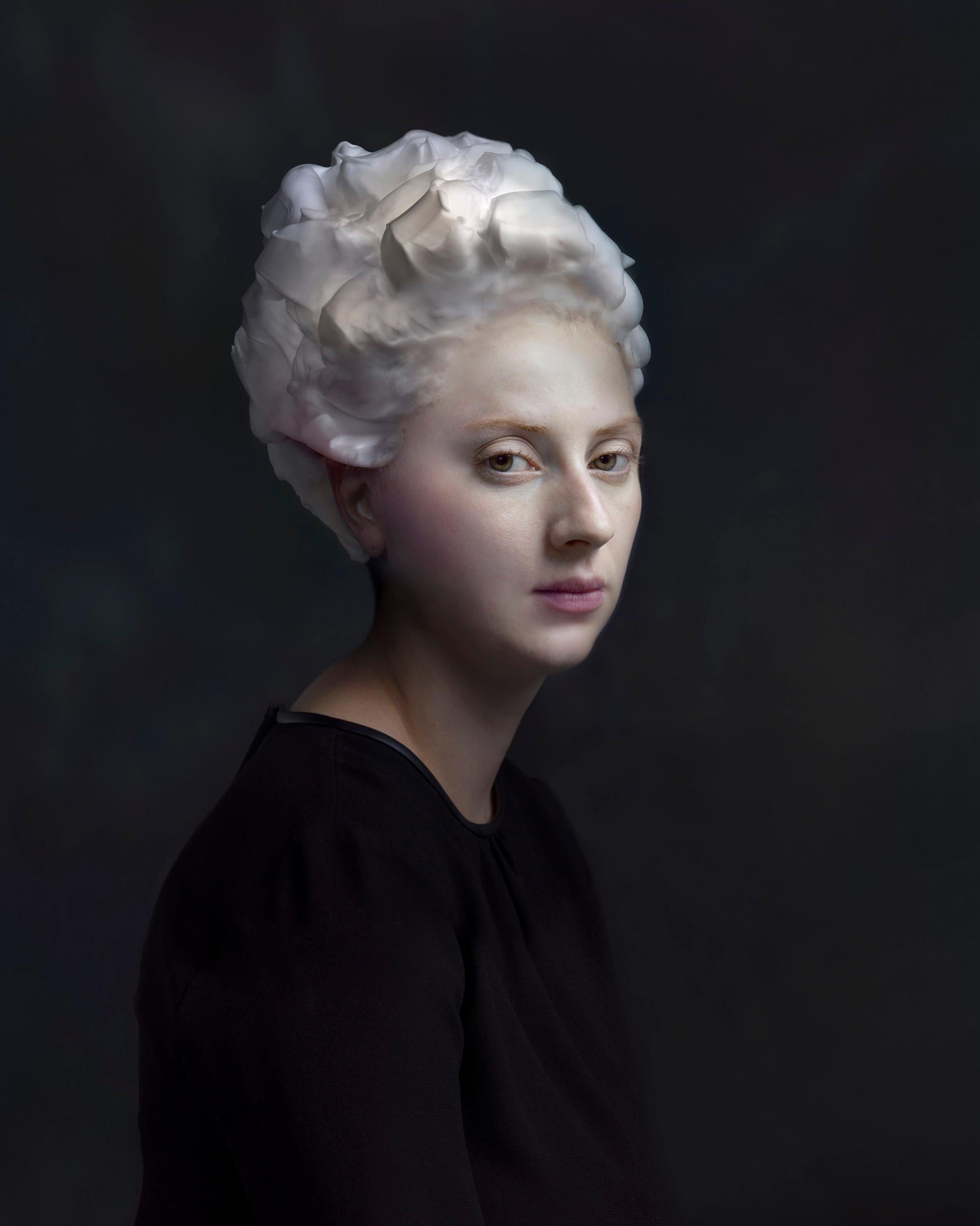 What famous Dutch painter’s works do Kerstens’a photographs resemble and why?