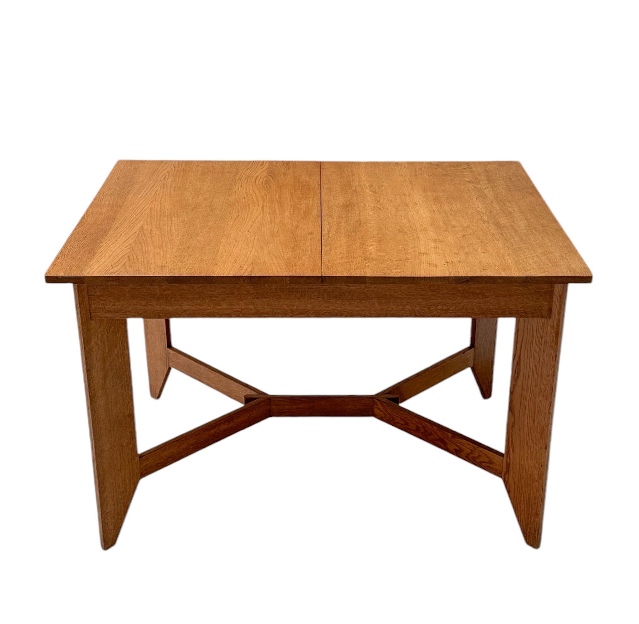 Stunning and rare Art Deco Modernist extending dining room table.
Design by Hendrik Wouda for H. Pander & Zonen Den Haag.
Striking Dutch design from the 1920s.
Solid oak base with two original solid oak extensions.
Marked with manufacturers brand
