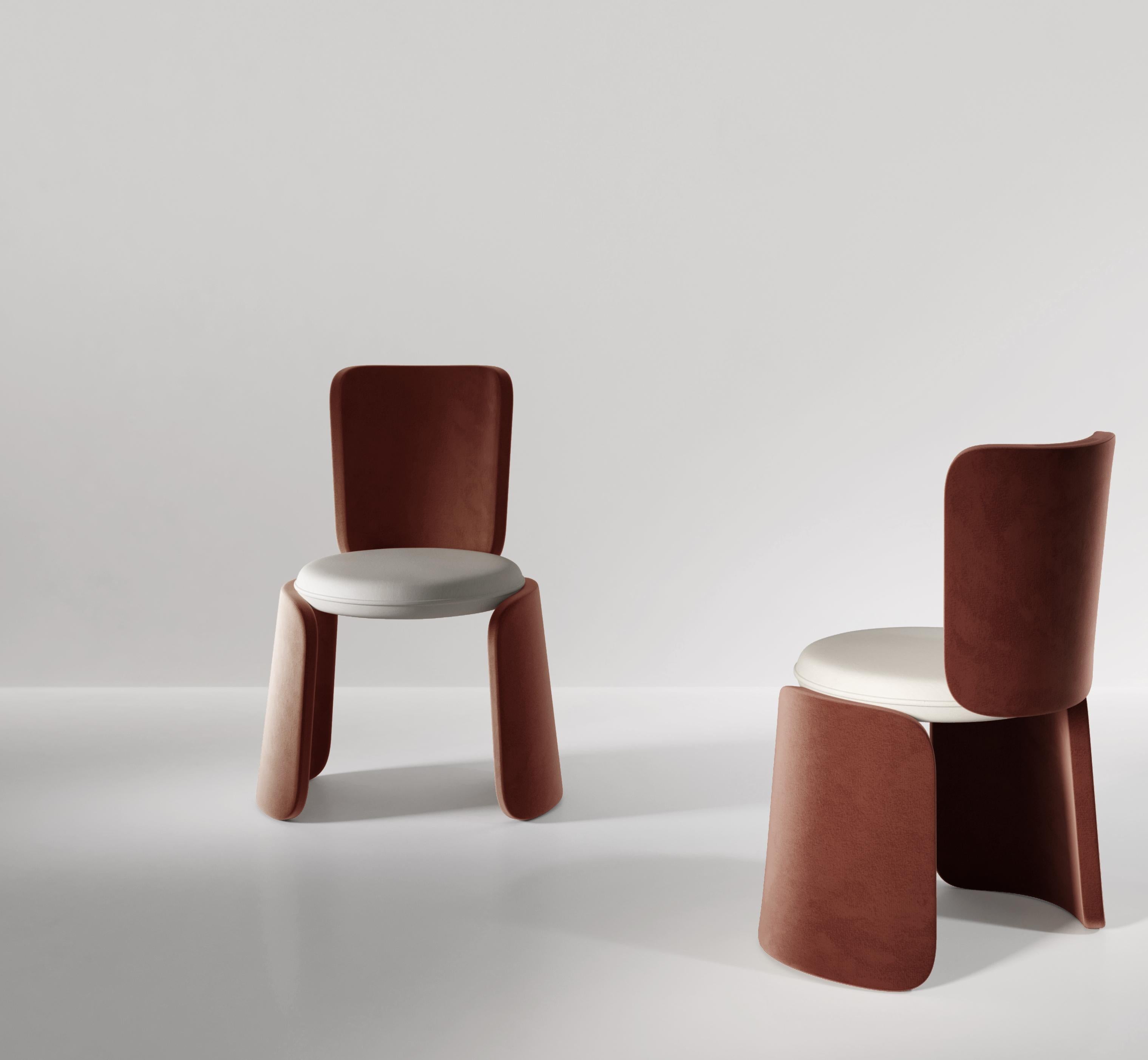 The Henge chair is comprised of three identical pieces and a seat. Two of the pieces make up the legs and the third acts as the back. The chair takes its name from Stone Henge in United Kingdom, where two huge pieces of stone hold up a third. Henge