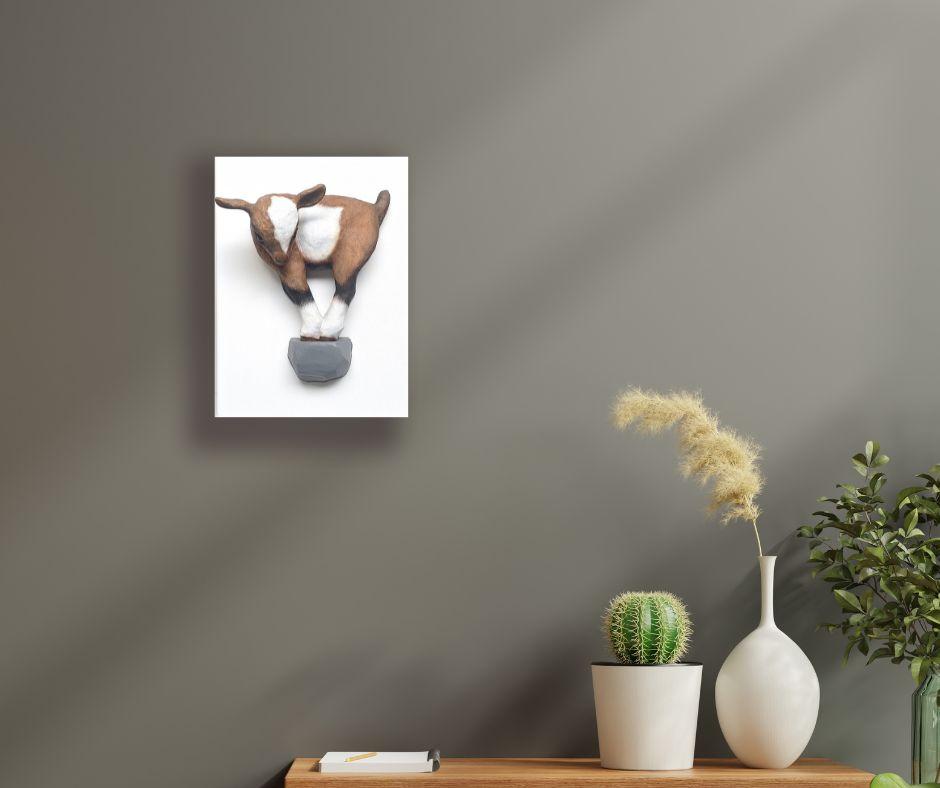 This exceptional artwork is currently on display and available for sale at Signet Contemporary Art Gallery and online.

Striking a balance between whimsy and wonder, “Elevated” by Henk Jan Sanderman captures the defiant grace of a young goat poised