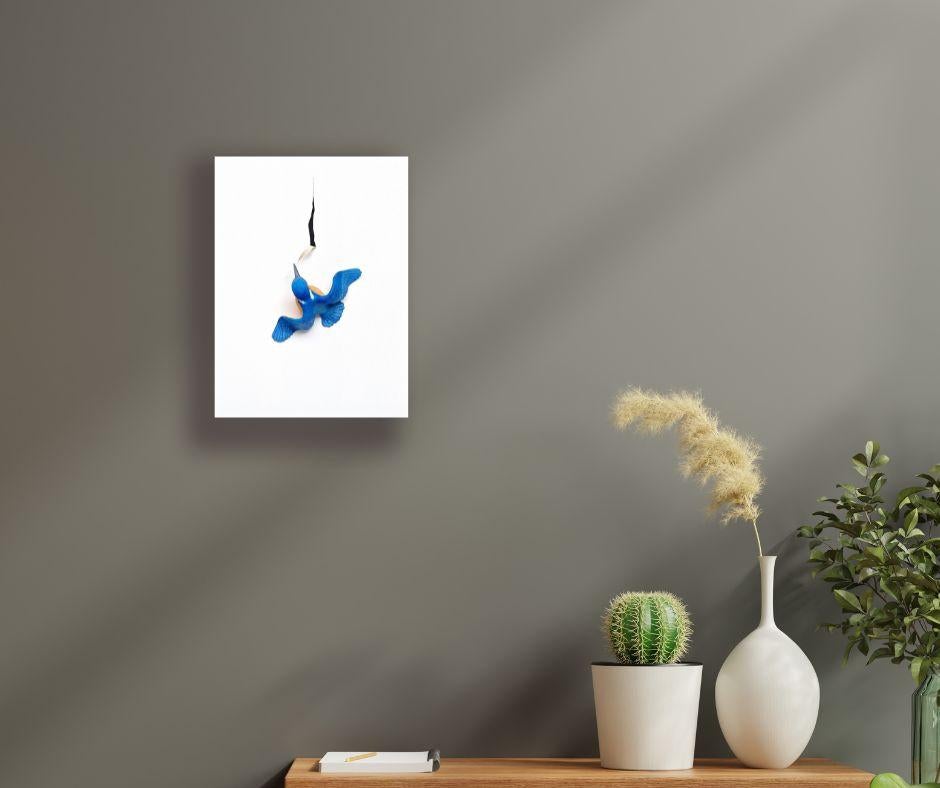 This exceptional artwork is currently on display and available for sale at Signet Contemporary Art Gallery and online.

Brimming with narrative energy, “Pickingfisher” plunges into a moment of motion stilled in flight, as a vibrant kingfisher