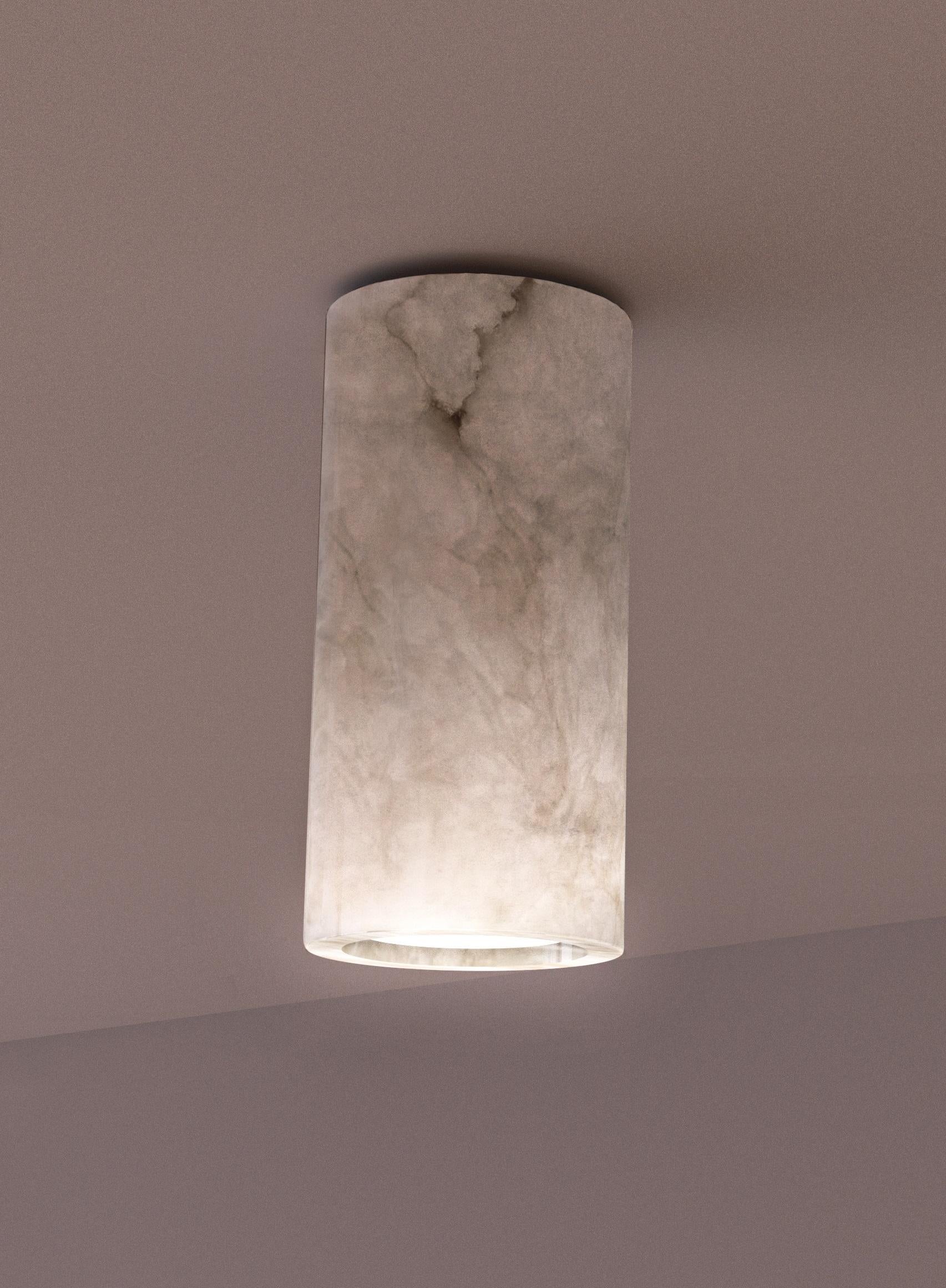 Henka White Alabaster Spotlight by Alabastro Italiano
Dimensions: Ø 7,2 x H 15 cm.
Materials: White alabaster.

Available in white alabaster and iroko wood. Please contact us.

All our lamps can be wired according to each country. If sold to the USA