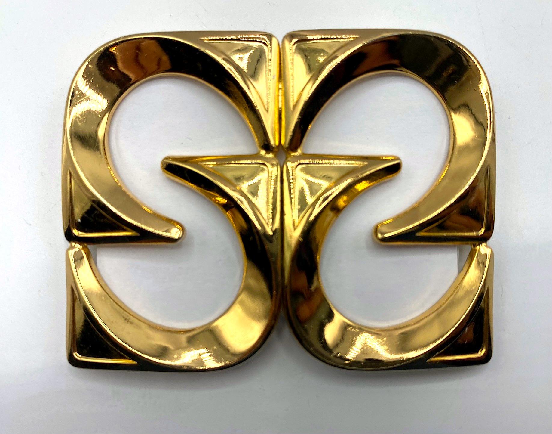 A wonderful example of a 1970s abstract modernist brooch by the well know German company Henkel & Gross. Measuring 2.5 inches wide and 1.88 inches high, the brooch is gold plated. It is comprised of a design of four square 