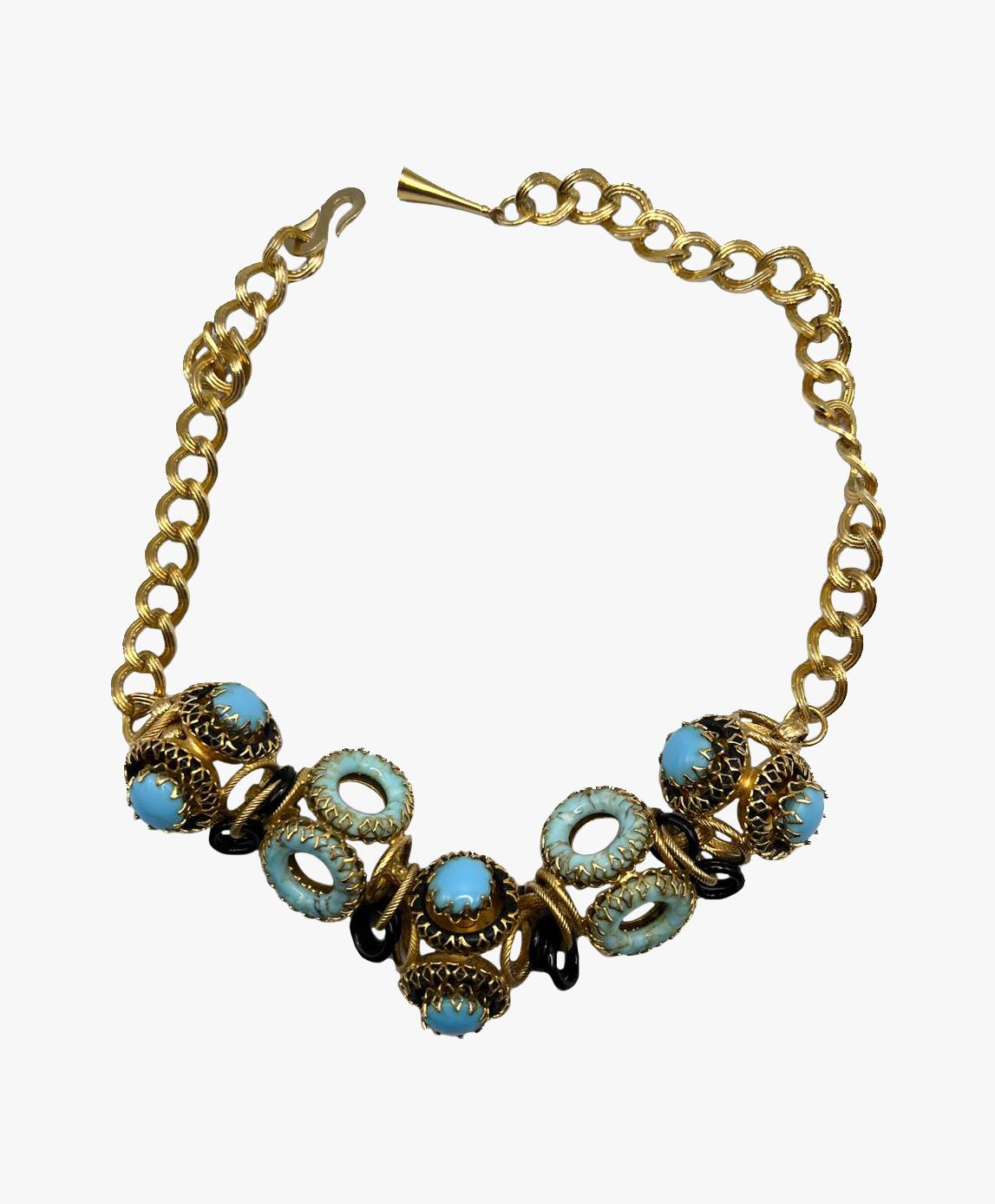 Henkel & Grosse Germany for Christian Dior necklace with blue turquoise glass showcased in golden hardware

Hook closure

Period – 1960’s

Unsigned

Length – 20” / 50cm

Condition – very good

........Additional information ........

- Photo might