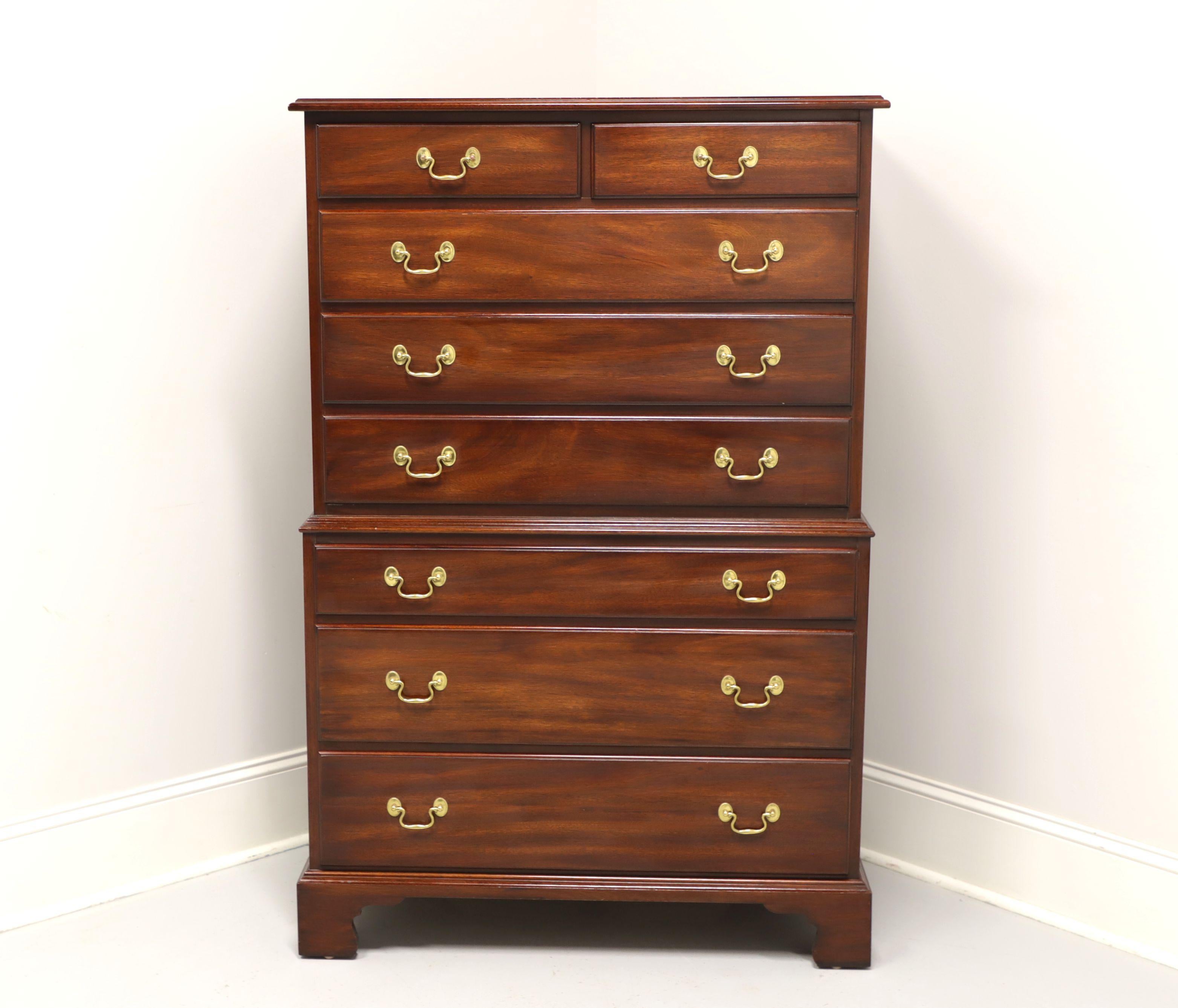 A Chippendale style chest on chest by Henkel Harris of Winchester, Virginia, USA, their 