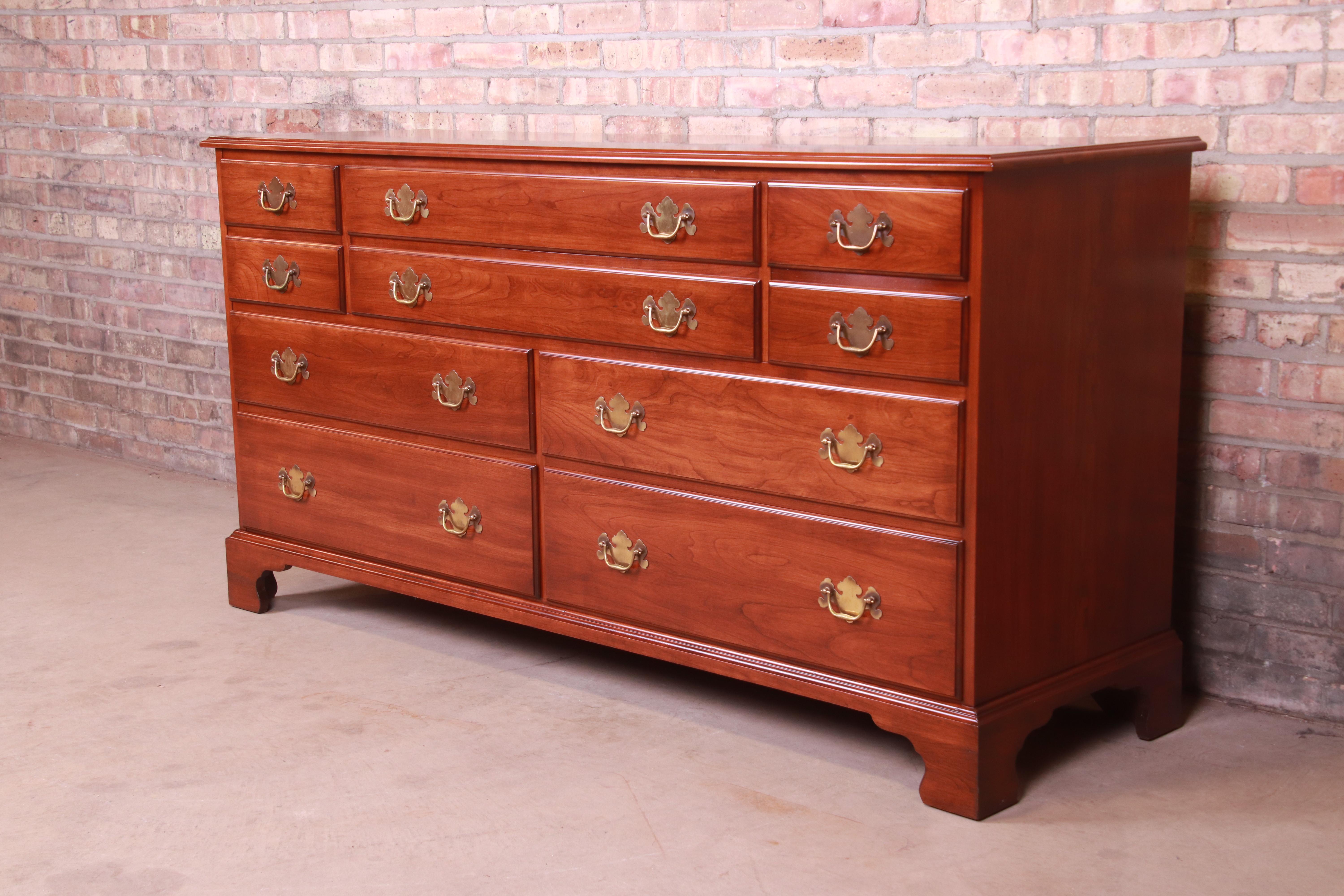 An exceptional American Chippendale style ten-drawer dresser or credenza

By Henkel Harris

USA, circa 1980s

Solid wild black cherrywood, with original brass hardware.

Measures: 66