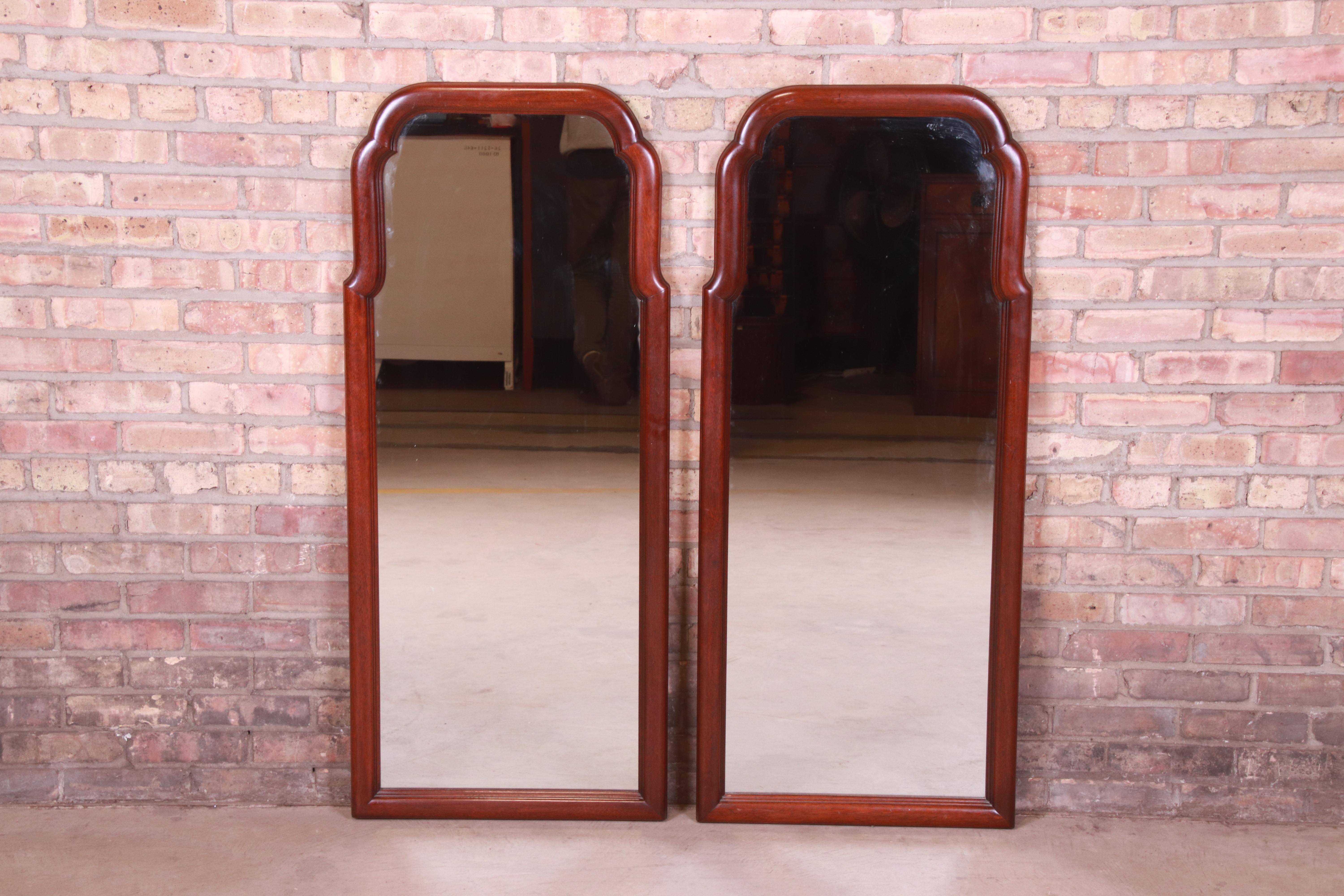 A beautiful pair of tall traditional carved mahogany framed wall mirrors

By Henkel Harris

USA, 1979

Measures: 21.25