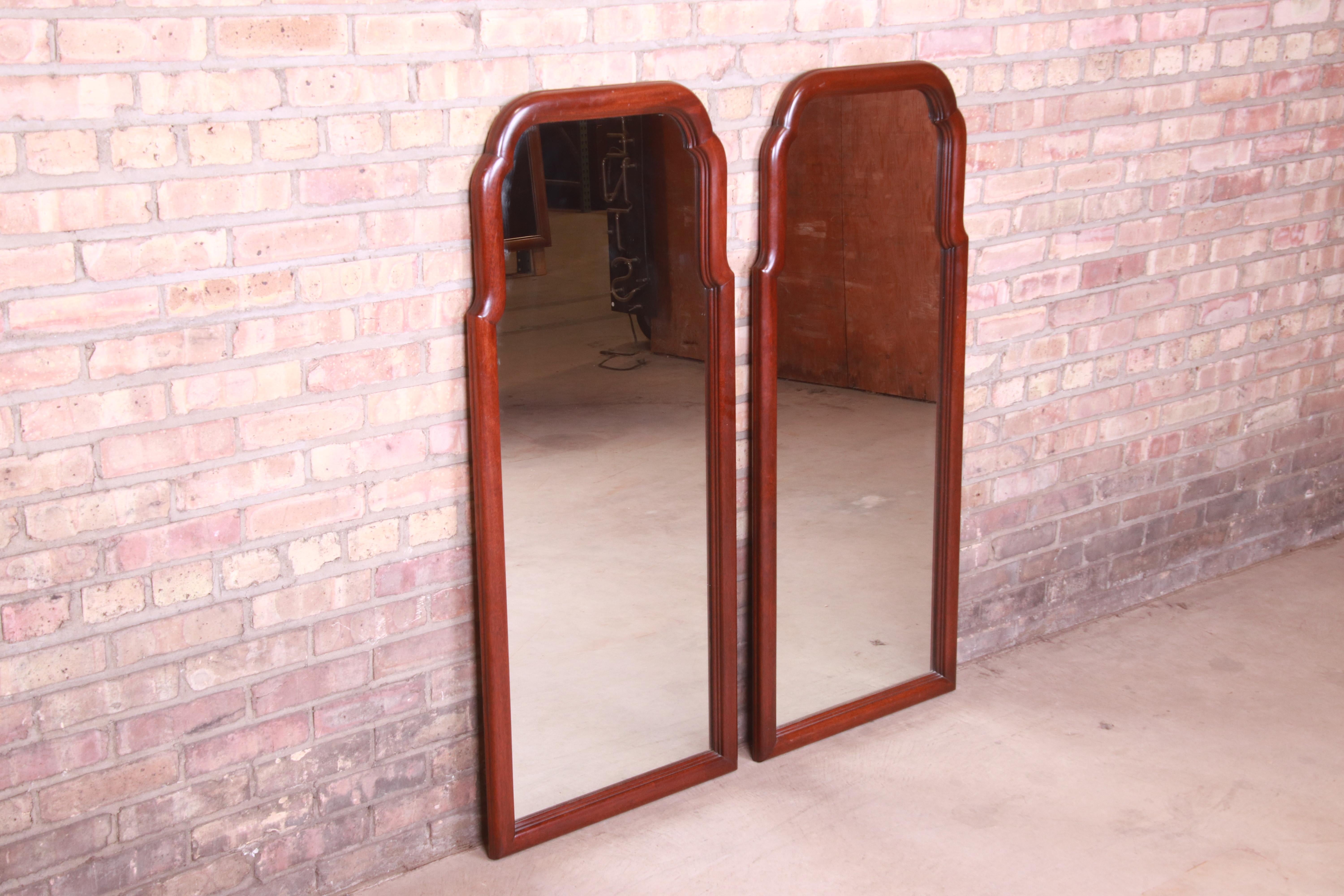 American Colonial Henkel Harris Carved Mahogany Framed Wall Mirrors, Pair