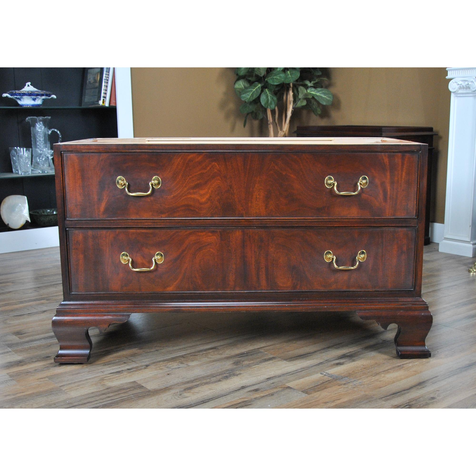 A vintage Henkel Harris Entertainment Center in excellent original, as found, condition.

Simple yet sophisticated, this beautiful Henkel Harris Entertainment Center has everything going for it and could easily be converted into a bar by adding