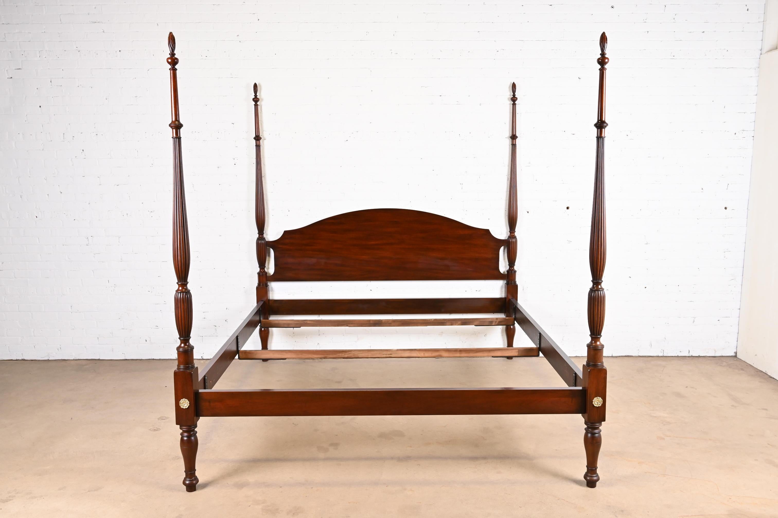 A gorgeous Georgian or Chippendale style four poster king size bed

By Henkel Harris

USA, 1998

Carved solid mahogany, with brass accents.

Measures: 83