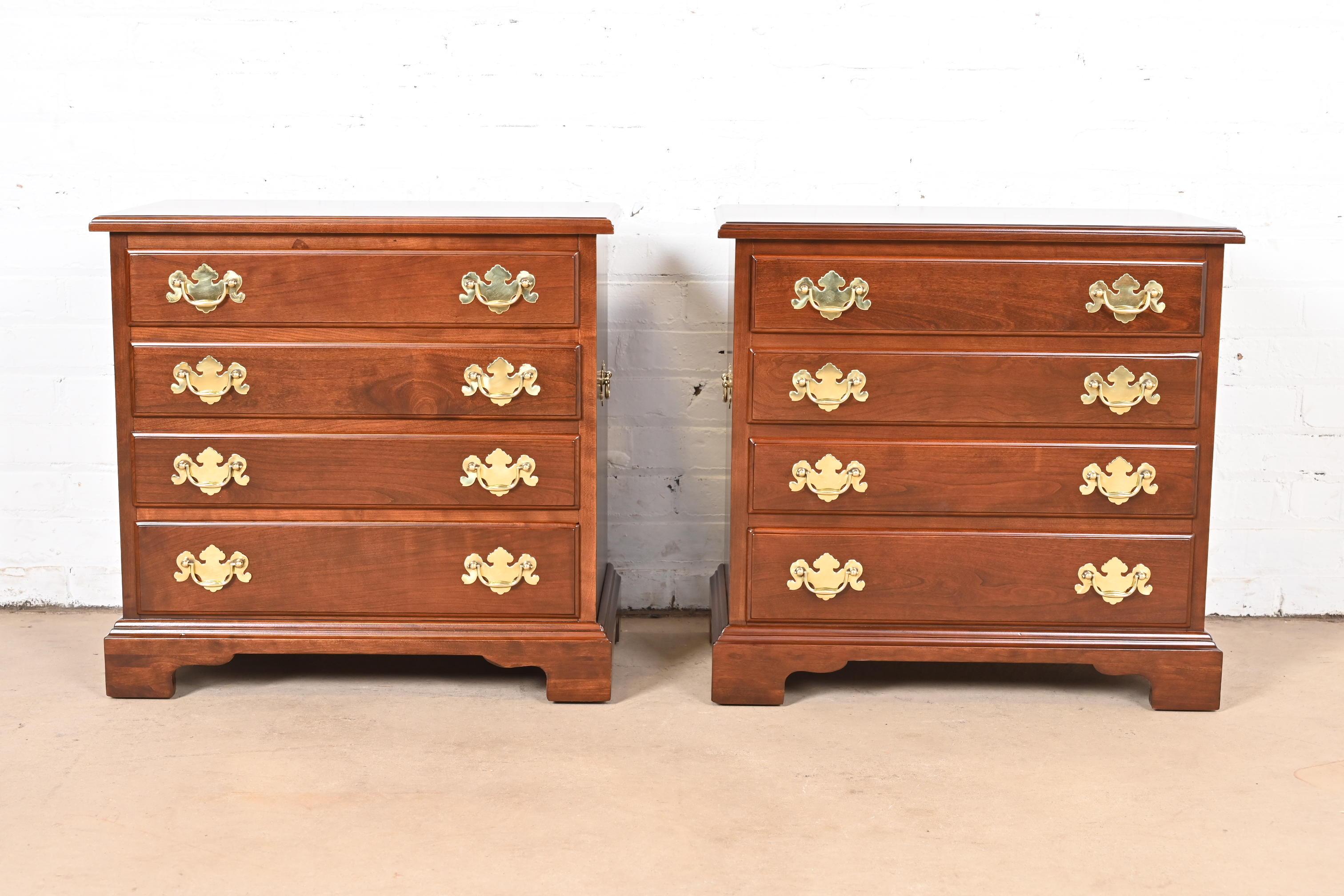A beautiful pair of Georgian or Chippendale style four-drawer bachelor chests or nightstands

By Henkel Harris

USA, 1969

Solid cherry wood, with original brass hardware.

Measures: 28