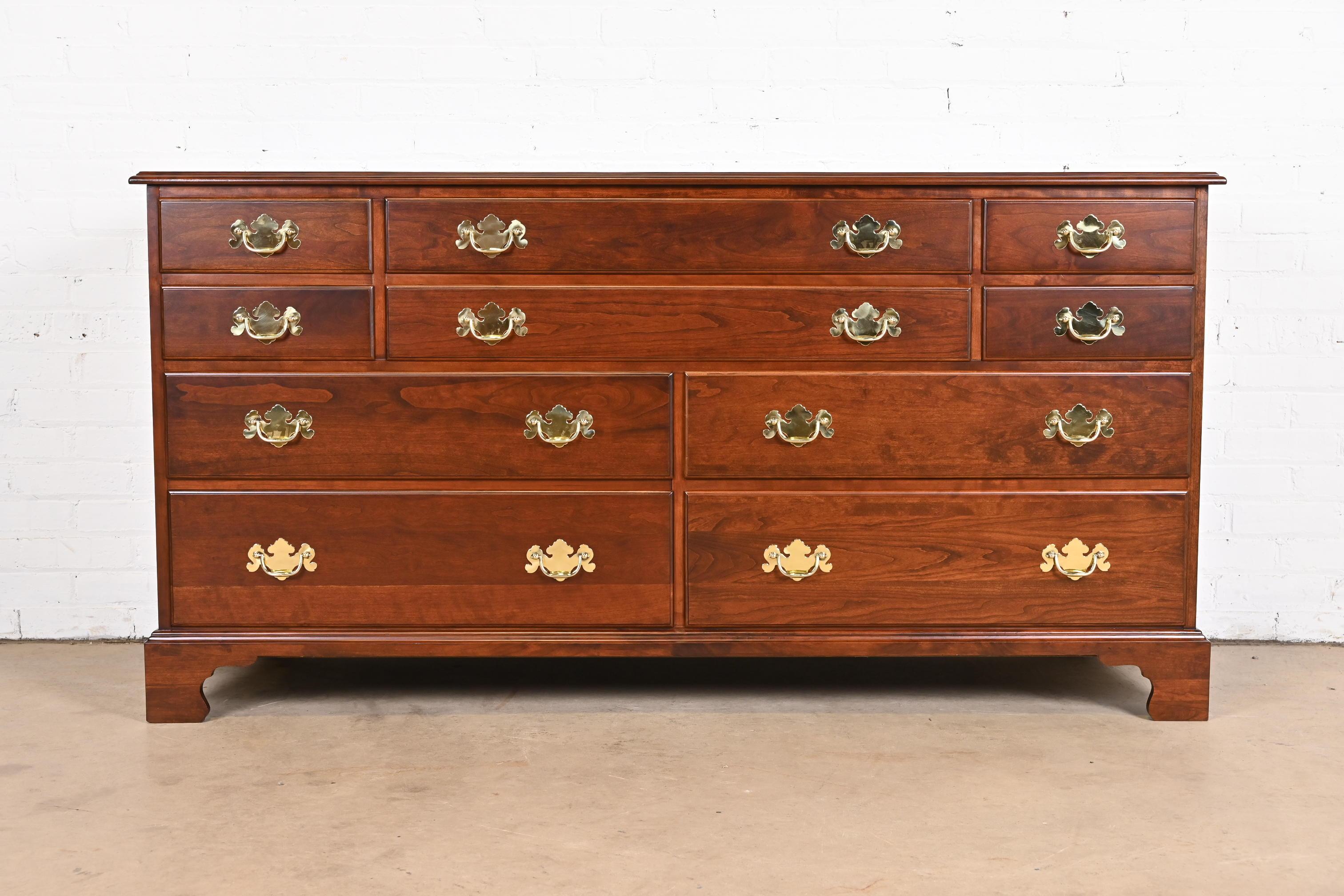 An exceptional Georgian or Chippendale style ten-drawer dresser or credenza

By Henkel Harris

USA, 1975

Solid wild black cherry wood, with original brass hardware.

Measures: 66