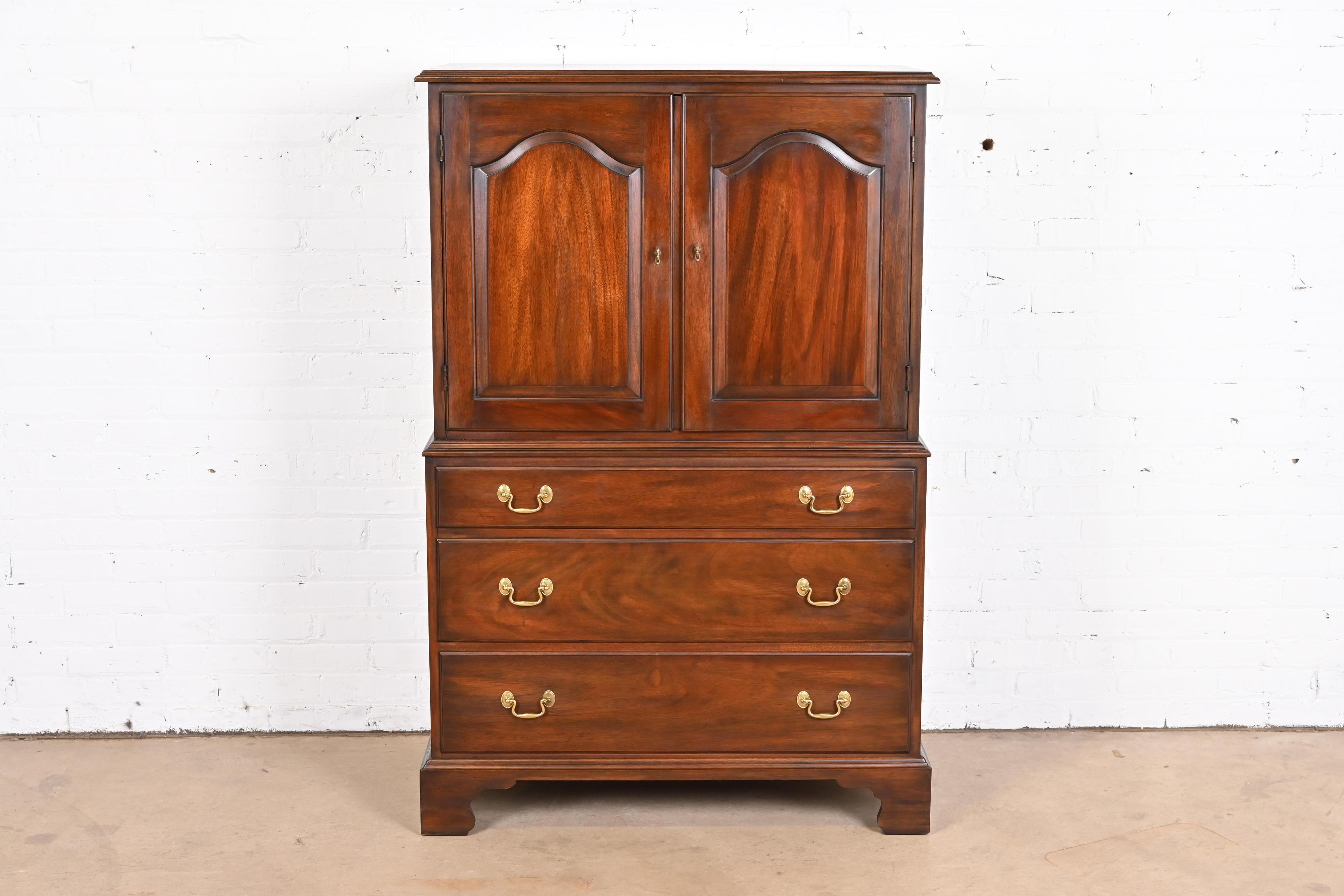 A gorgeous Georgian or Chippendale style highboy dresser or gentleman's chest

By Henkel Harris

USA, 1971

Solid mahogany, with original brass hardware.

Measures: 37.38