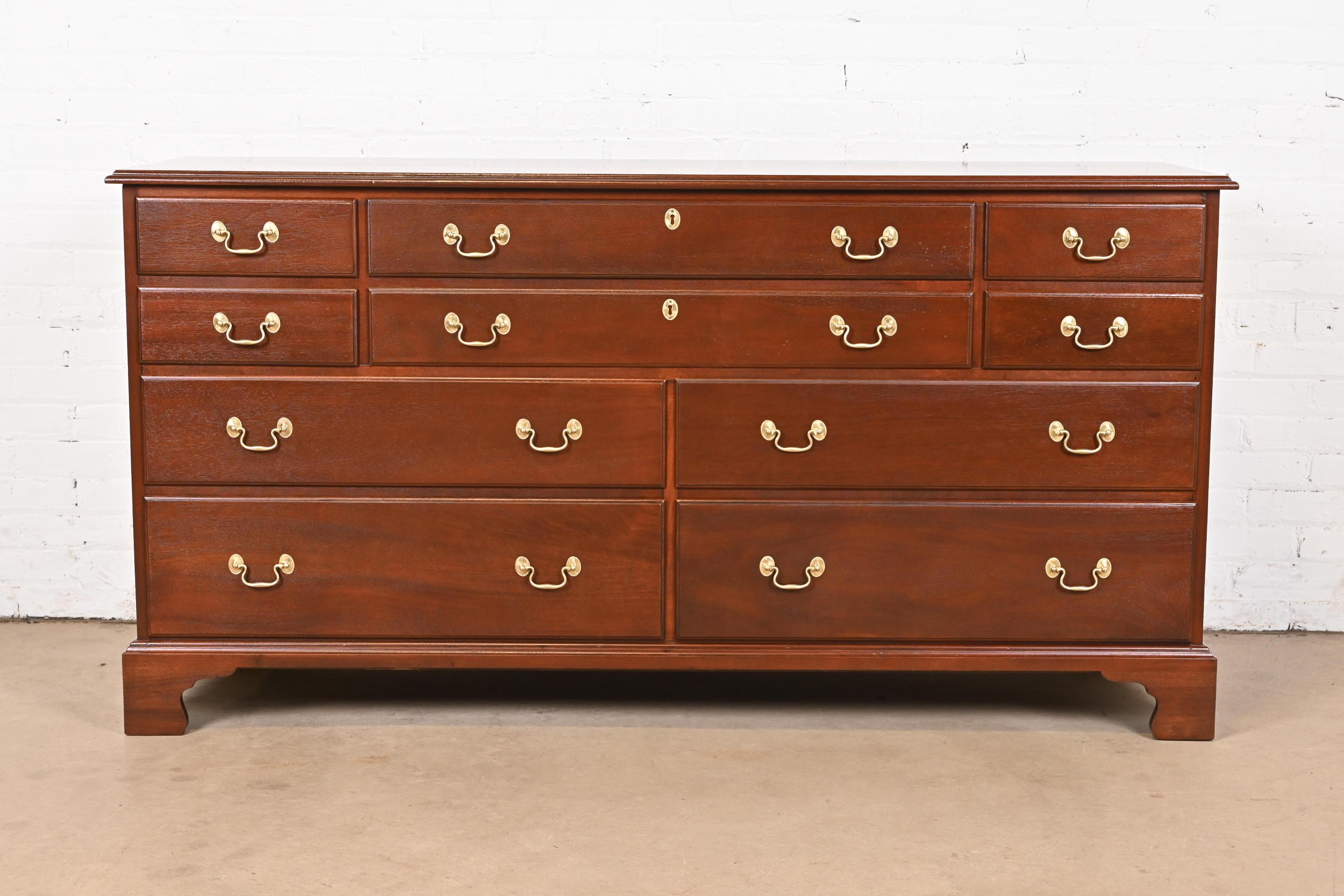 A gorgeous Georgian or Chippendale style ten-drawer dresser or credenza

By Henkel Harris

USA, 1978

Solid mahogany, with original brass hardware.

Measures: 65.75