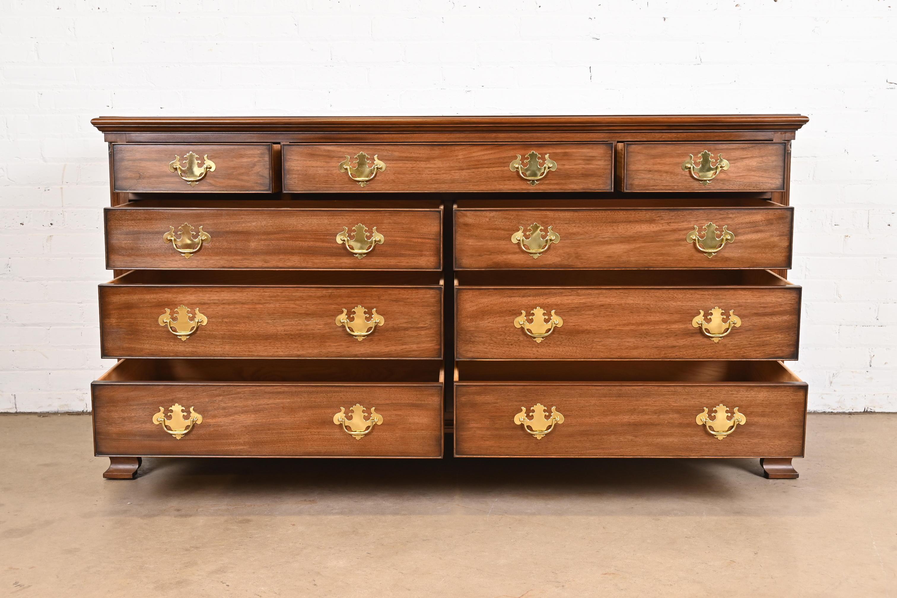 Brass Henkel Harris Georgian Solid Walnut Nine-Drawer Dresser For Sale