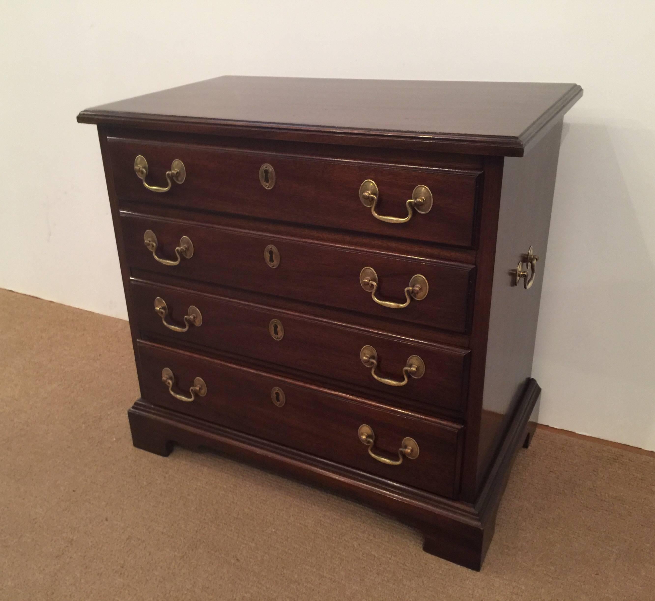 Nice Henkel-Harris mahogany diminutive bachelors chest with brass pulls. Total of four drawers.