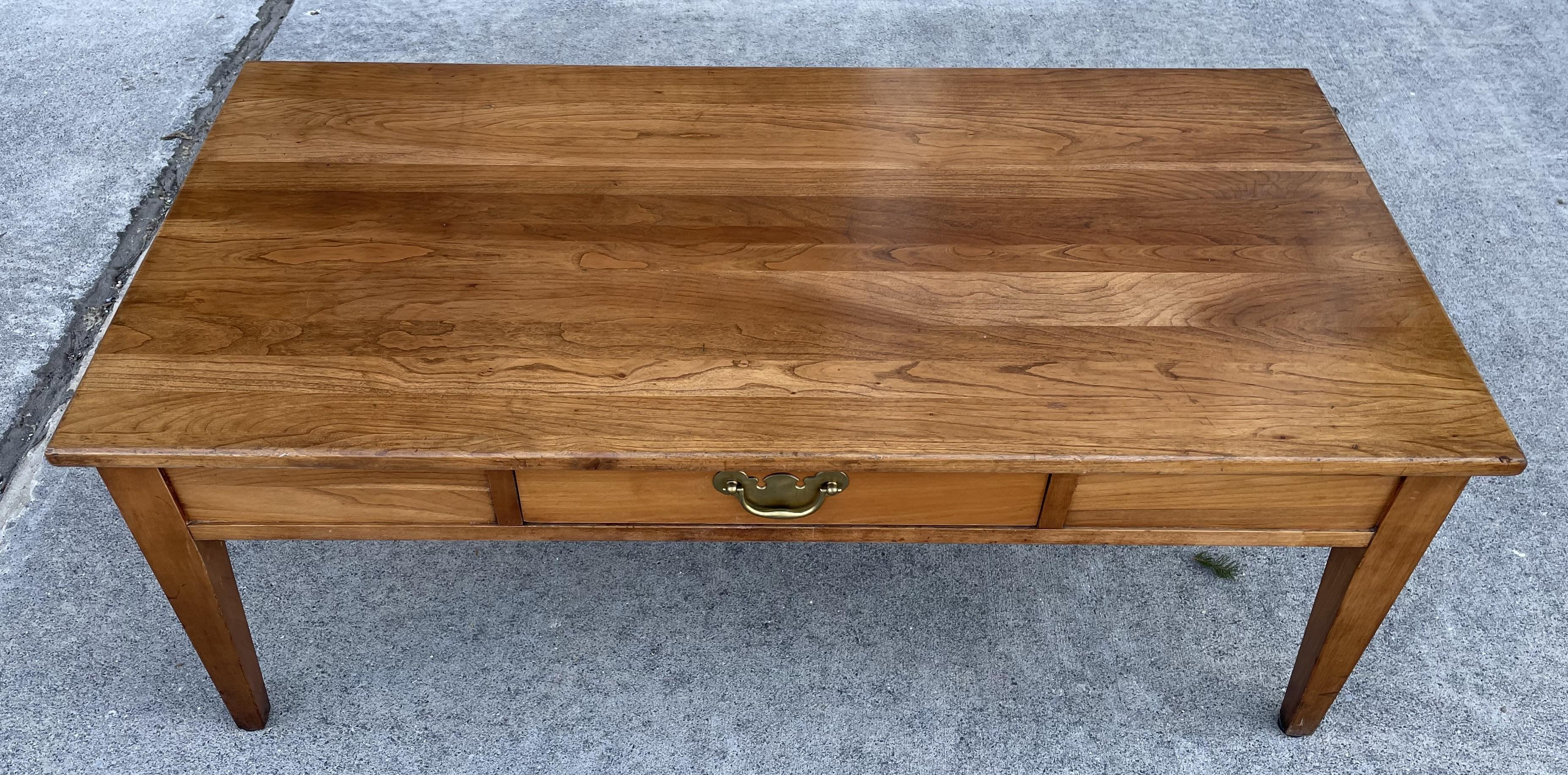 This sweet table is absolutely the best quality, the wood is beautiful, solid and finely crafted. The style is simple with a timeless elegance that will last for many generations. There is a drawer in the front with a pretty brass handle and a fake