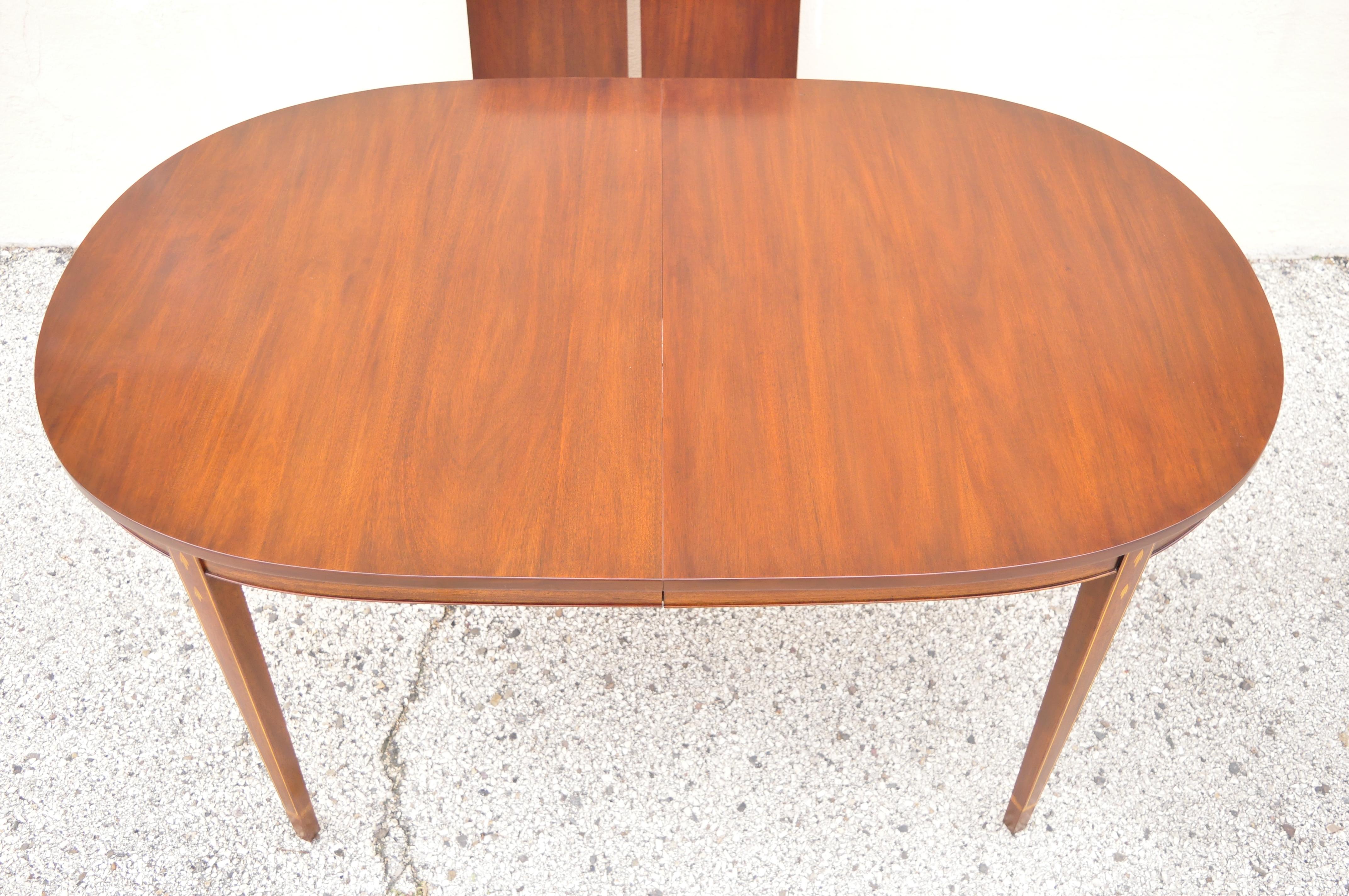 North American Henkel Harris Oval Mahogany Dining Room Table with Inlaid Legs and Two Leaves