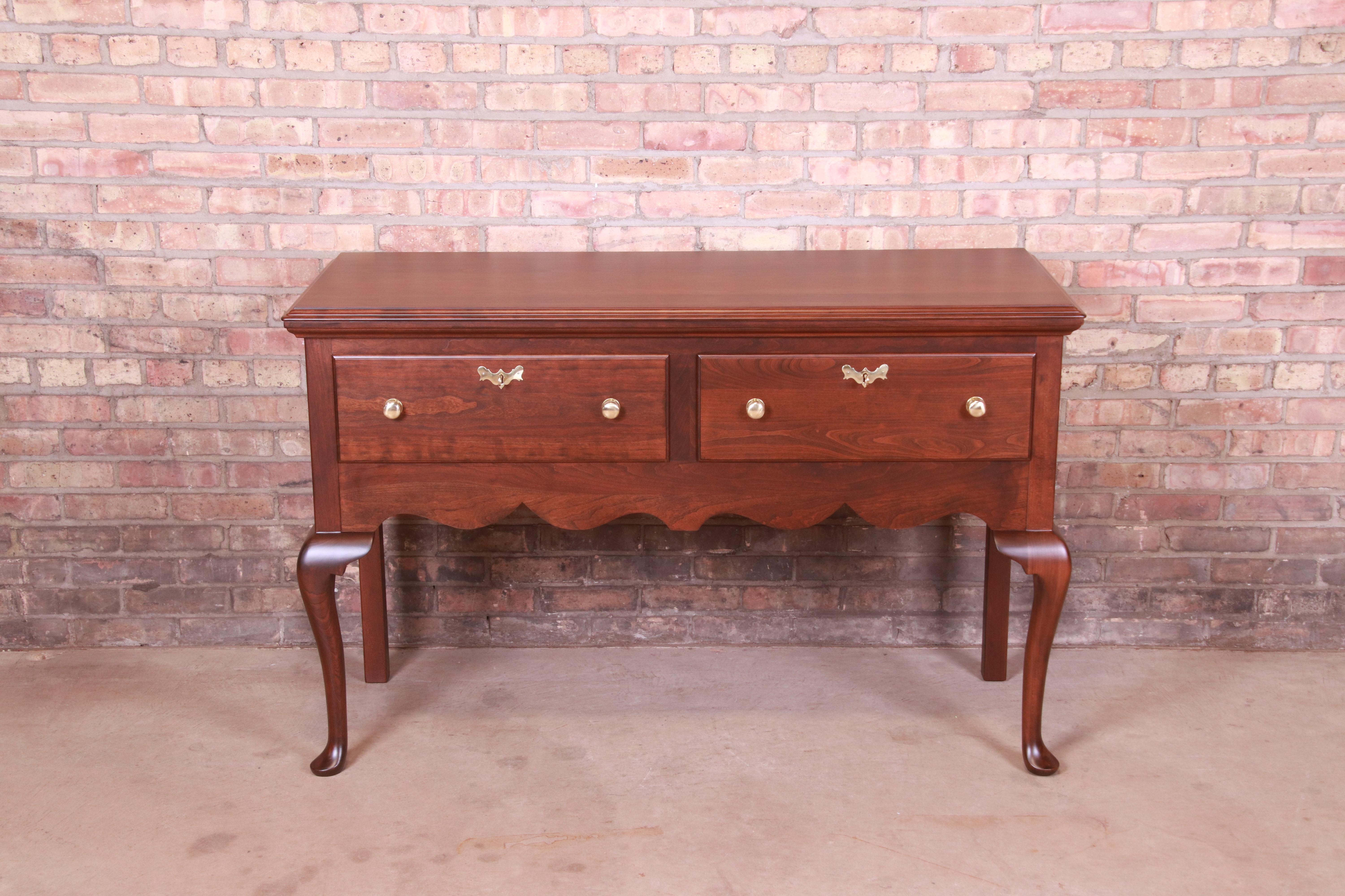 An exceptional Queen Anne style sideboard, buffet server, or console

By Henkel Harris

USA, 1972

Solid cherry wood, with original brass hardware. Drawers lock, and original keys are included.

Measures: 53.25