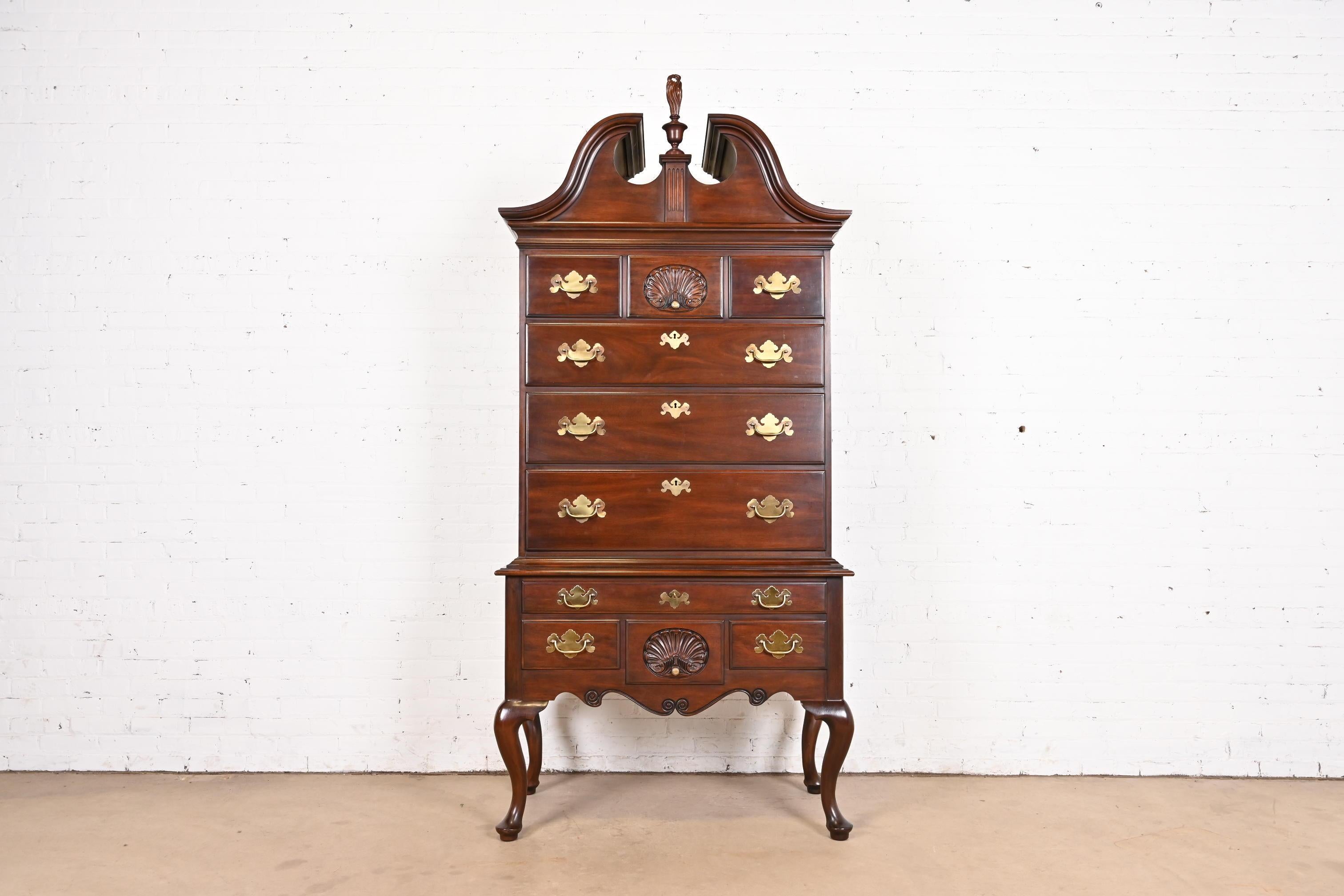 An exceptional Queen Anne or Chippendale style highboy dresser

By Henkel Harris

USA, Circa 1977

Solid carved mahogany, with original brass hardware. Drawers lock, and key is included.

Measures: 41.25