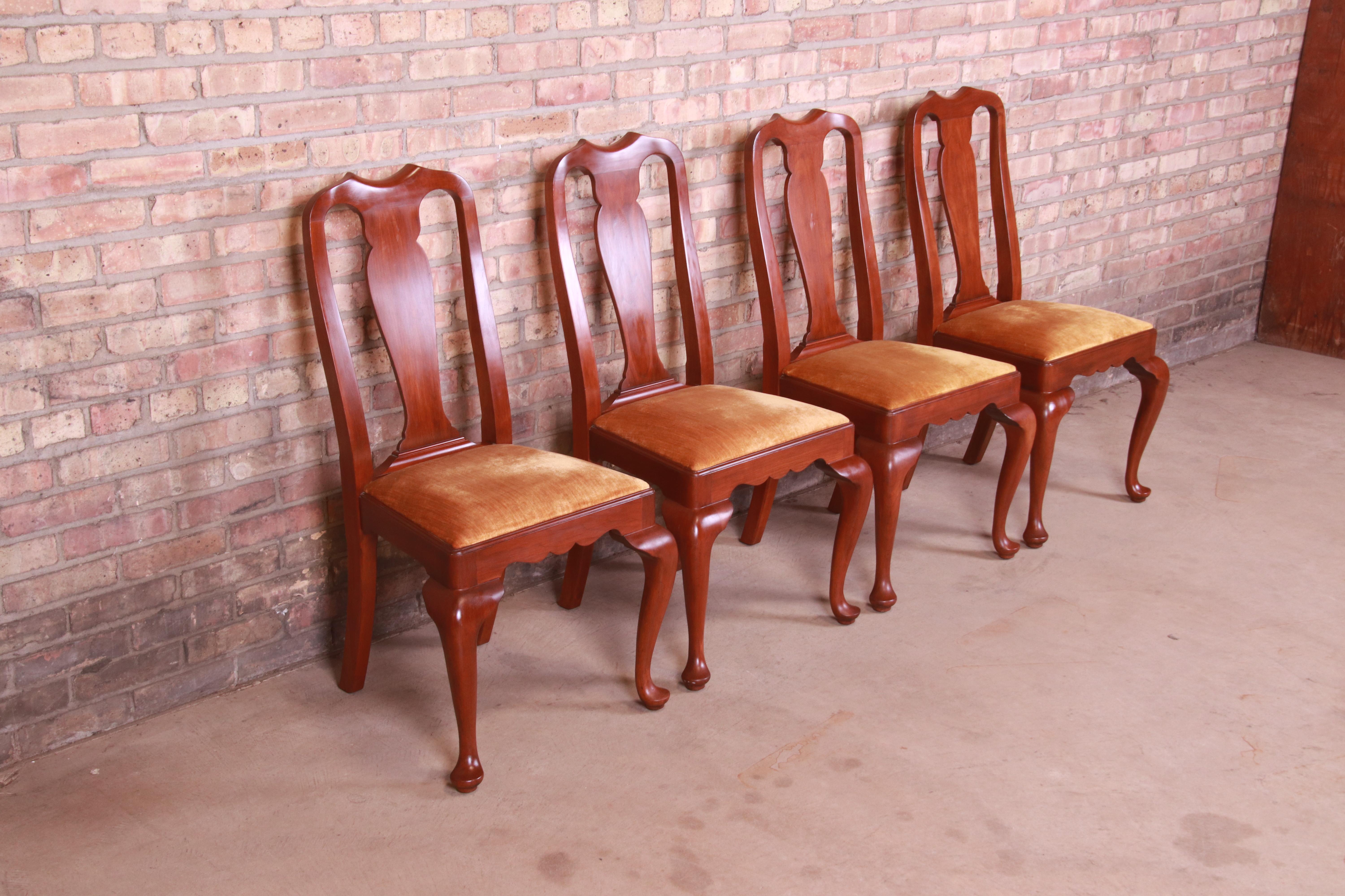 A gorgeous set of four Queen Anne style dining chairs

By Henkel Harris

USA, Circa 1980s

Solid cherry wood frames, with velvet upholstered seats.

Measures: 20.5
