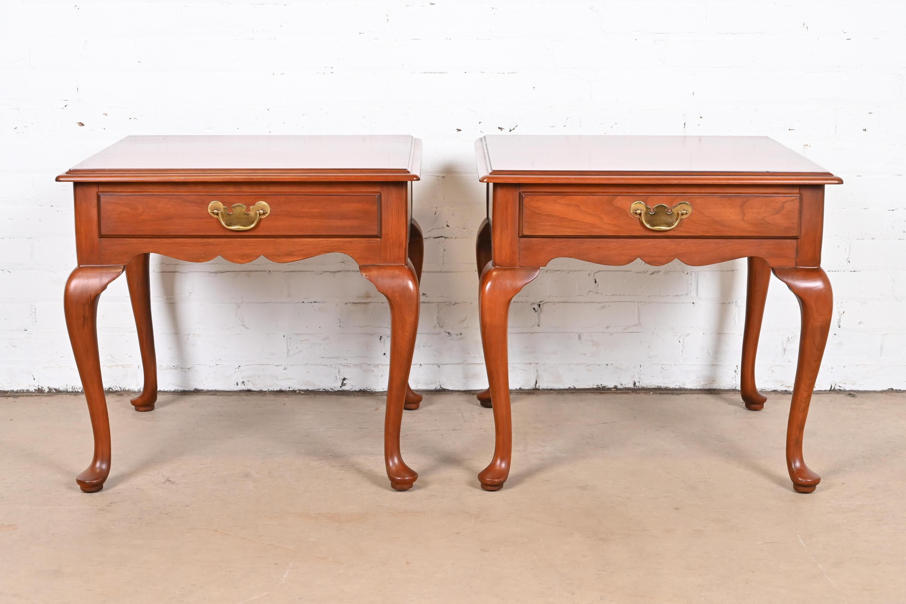 A gorgeous pair of Queen Anne style nightstands or end tables

By Henkel Harris

USA, 1966

Solid wild black cherry wood, with original brass hardware.

Measures: 24