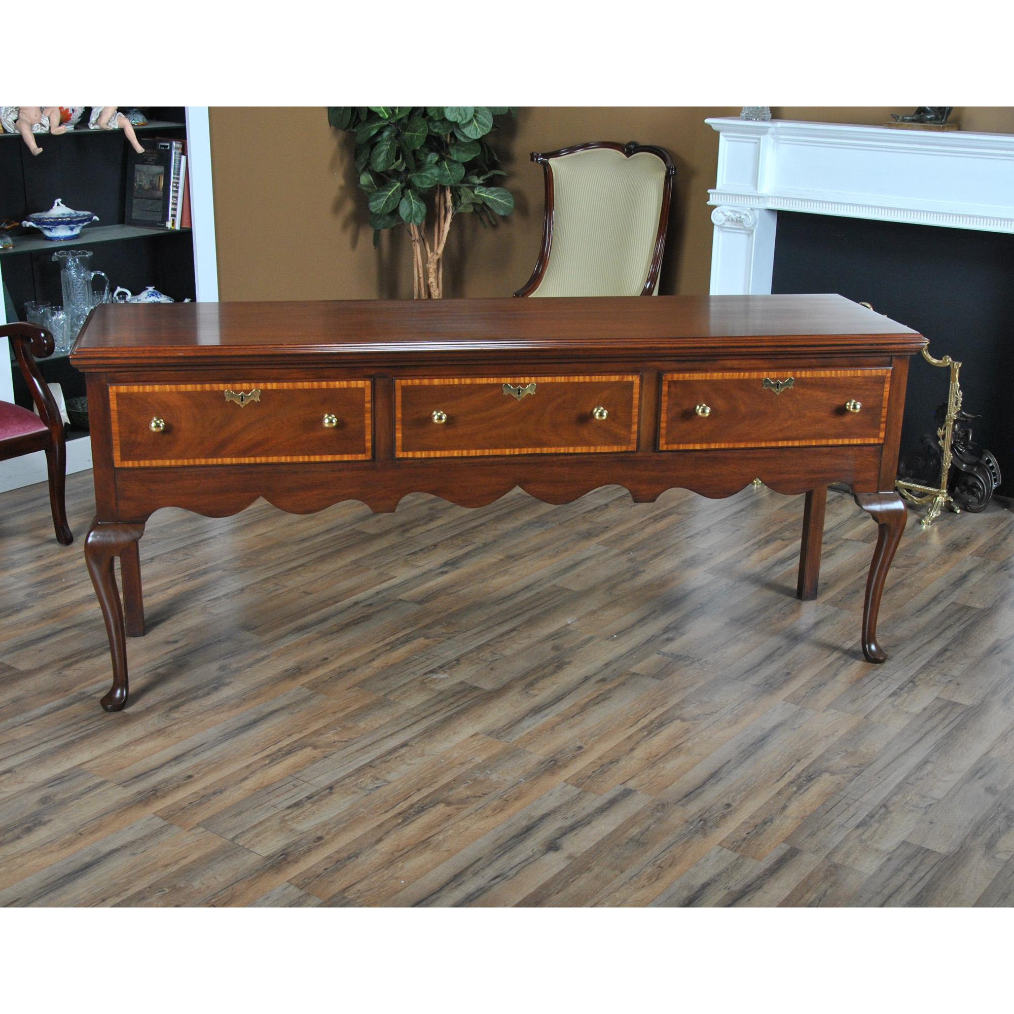 A vintage Henkel Harris Vintage Banded Sideboard in excellent condition, including a recently hand rubbed top, giving the sideboard a beautiful appearance.

Simple yet sophisticated this beautiful Henkel Harris Sideboard has everything going for