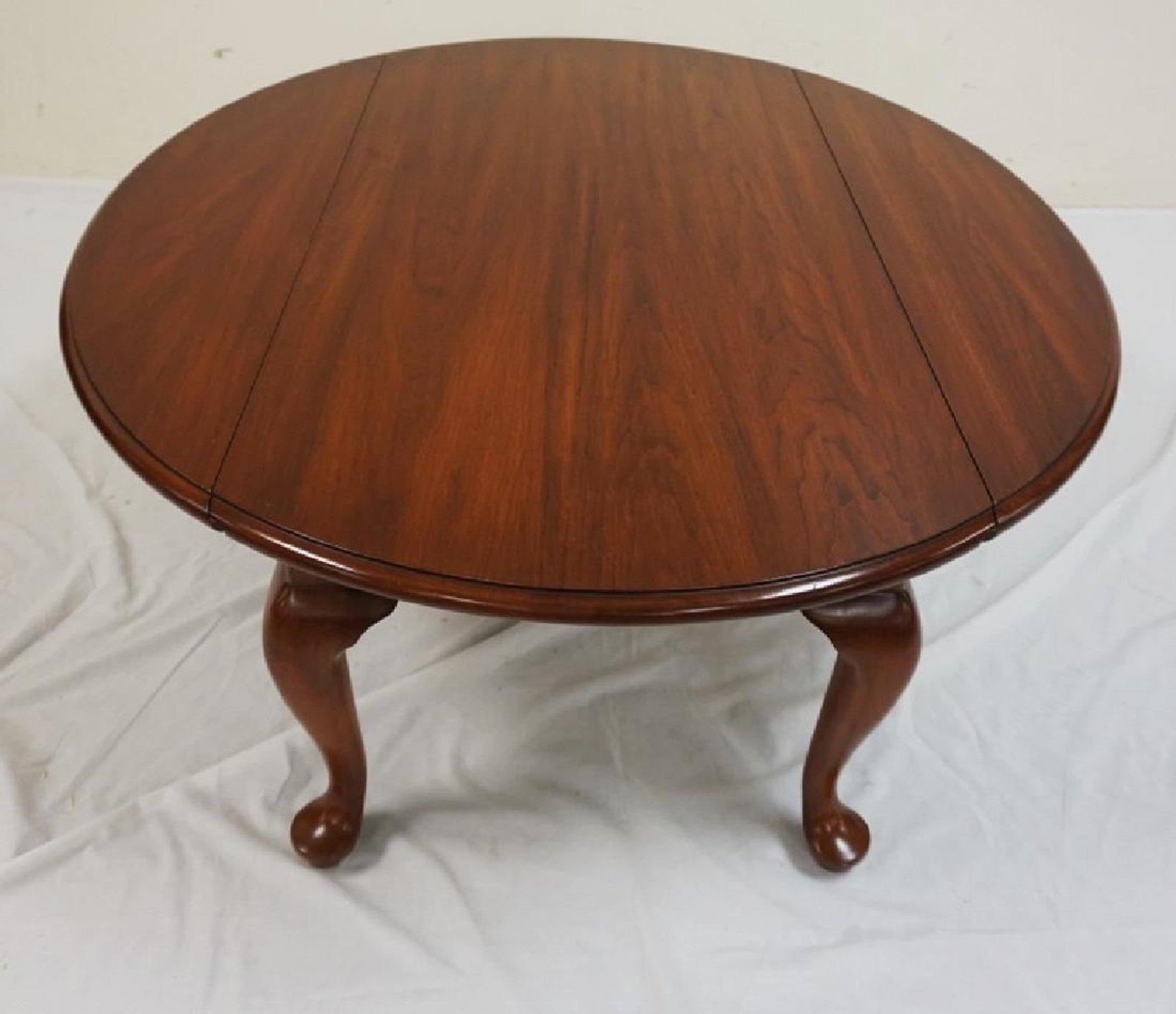 Henkel Harris Virginia galleries drop leaf coffee or end table 41.5 inches with leaves open up, 16.5 inches height. Wild cherry wood. Gorgeous rich finish, simple, sensuous line, all American material, just a classic, timeless, handcrafted
