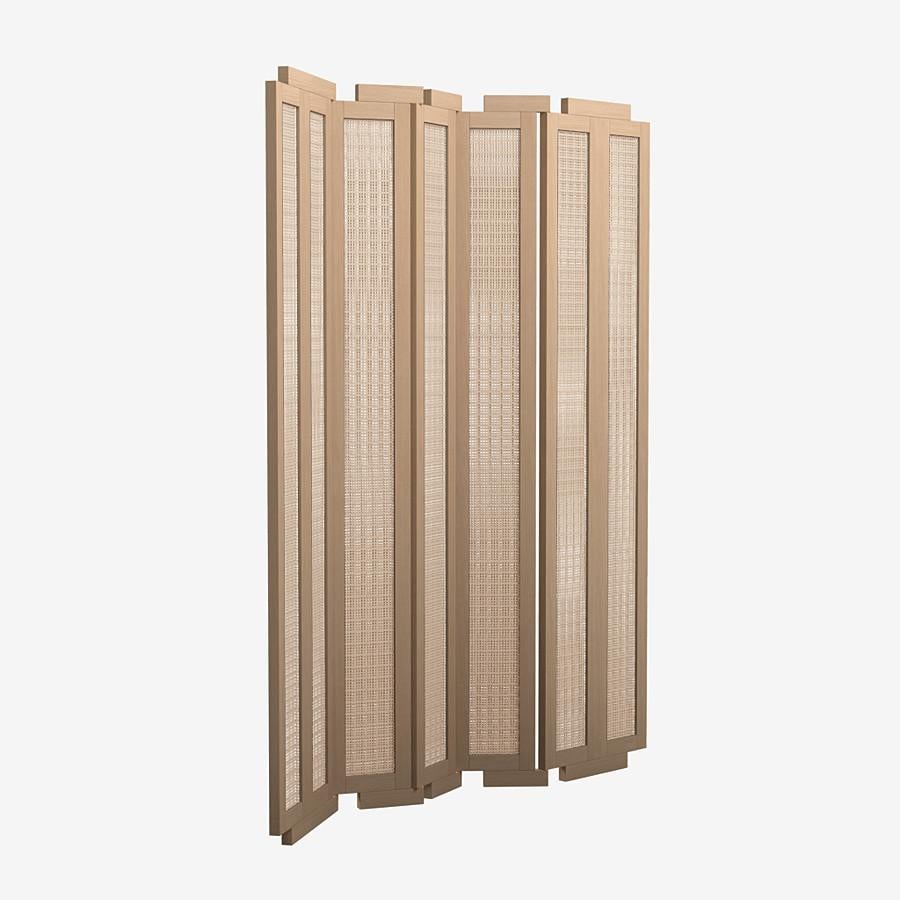 This Henley Street Paravant by Yabu Pushelberg in nude brushed ultra matte lacquered oak is paired with woven cane accents.

A sustainably sourced solid French oak frame is hand-hewn by craftsmen in the Netherlands. The sturdy frame is balanced
