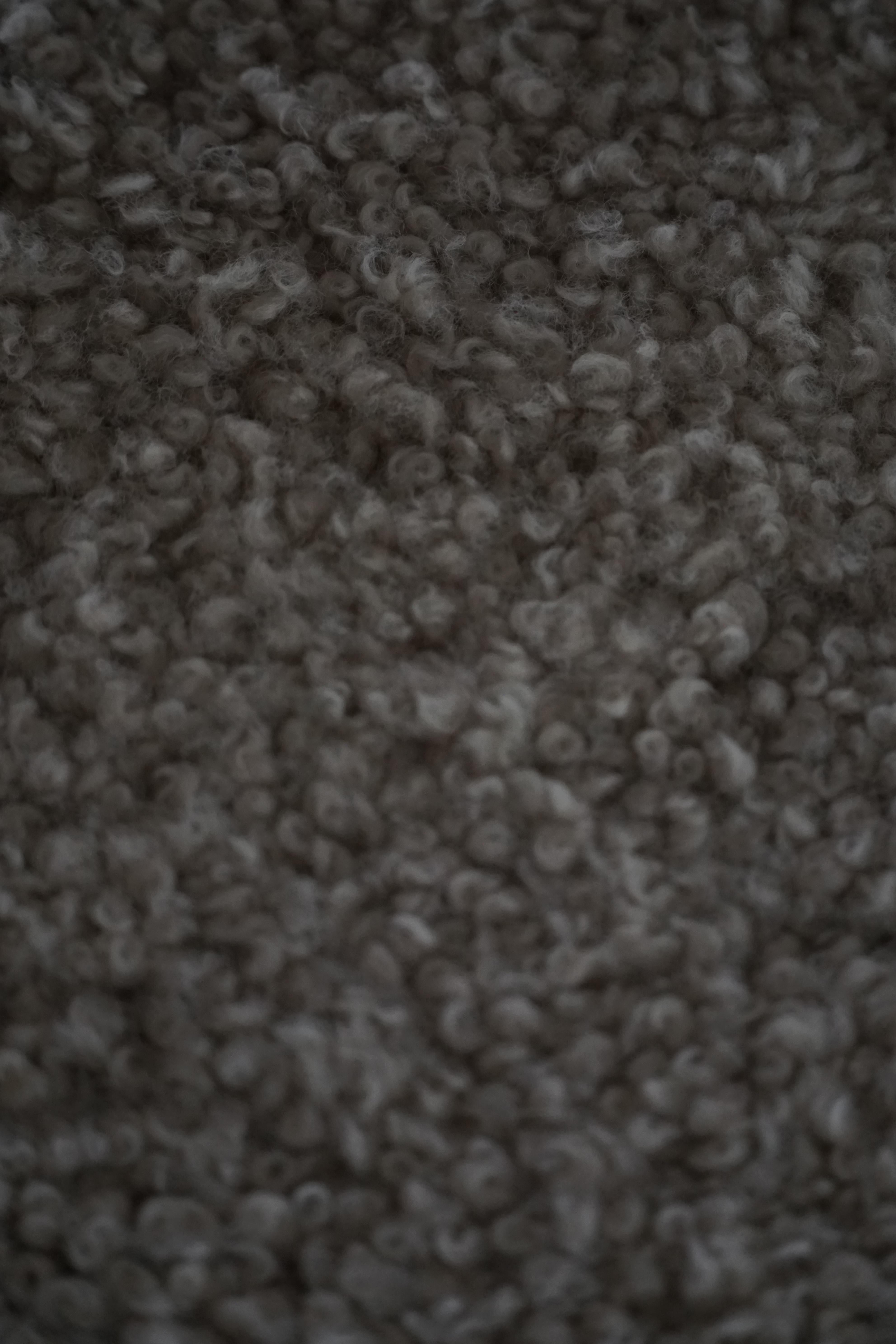 Henning Kjærnulf, Poltrona in Oak e lana d'agnello, modello 