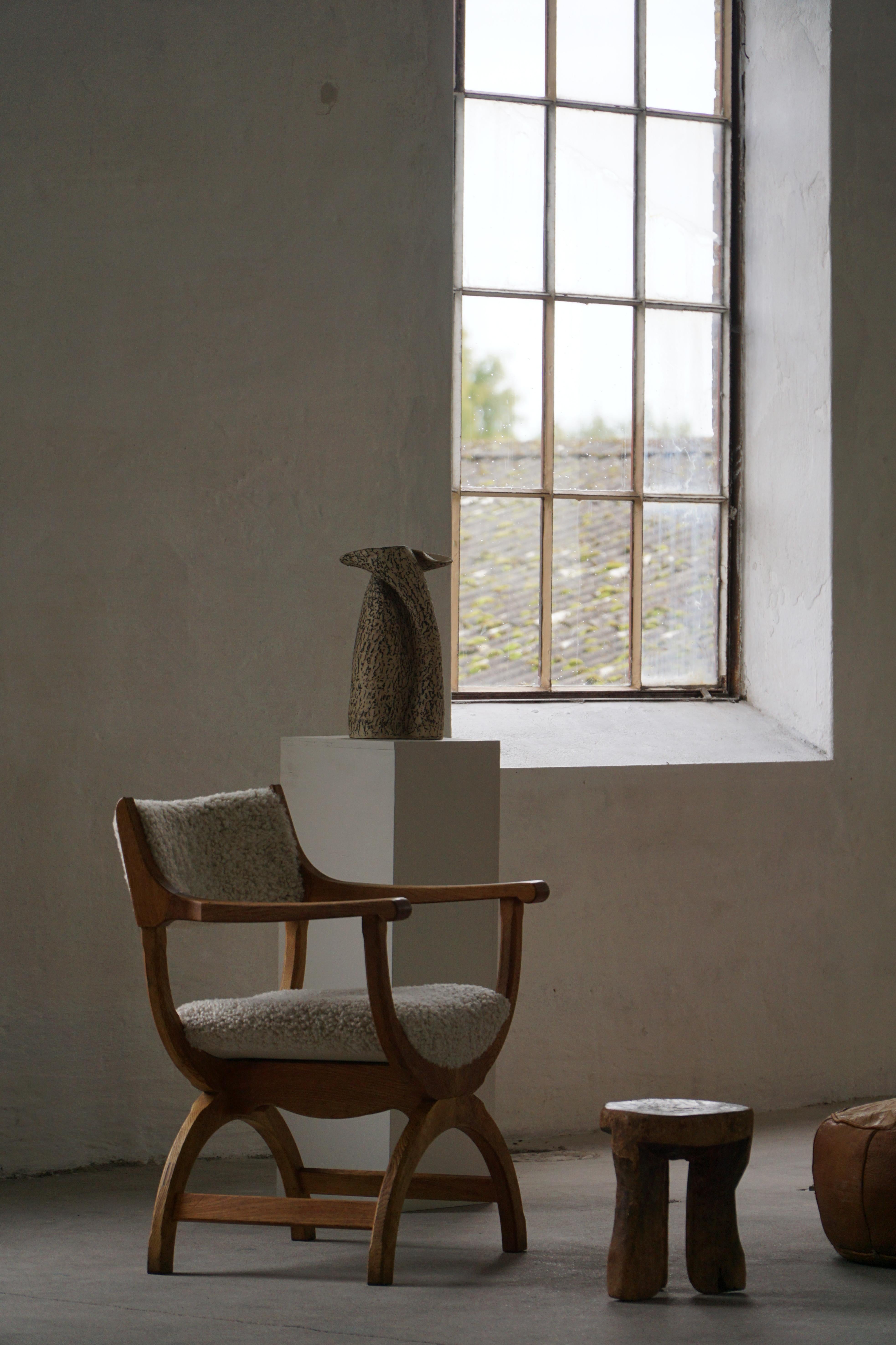 XX secolo Henning Kjærnulf, Poltrona in Oak e lana d'agnello, modello 