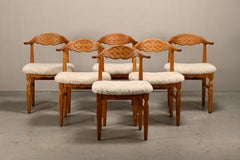 Henning Kjærnulf brutalist dining chairs set in Oak and Sheepskin, Denmark 1960s