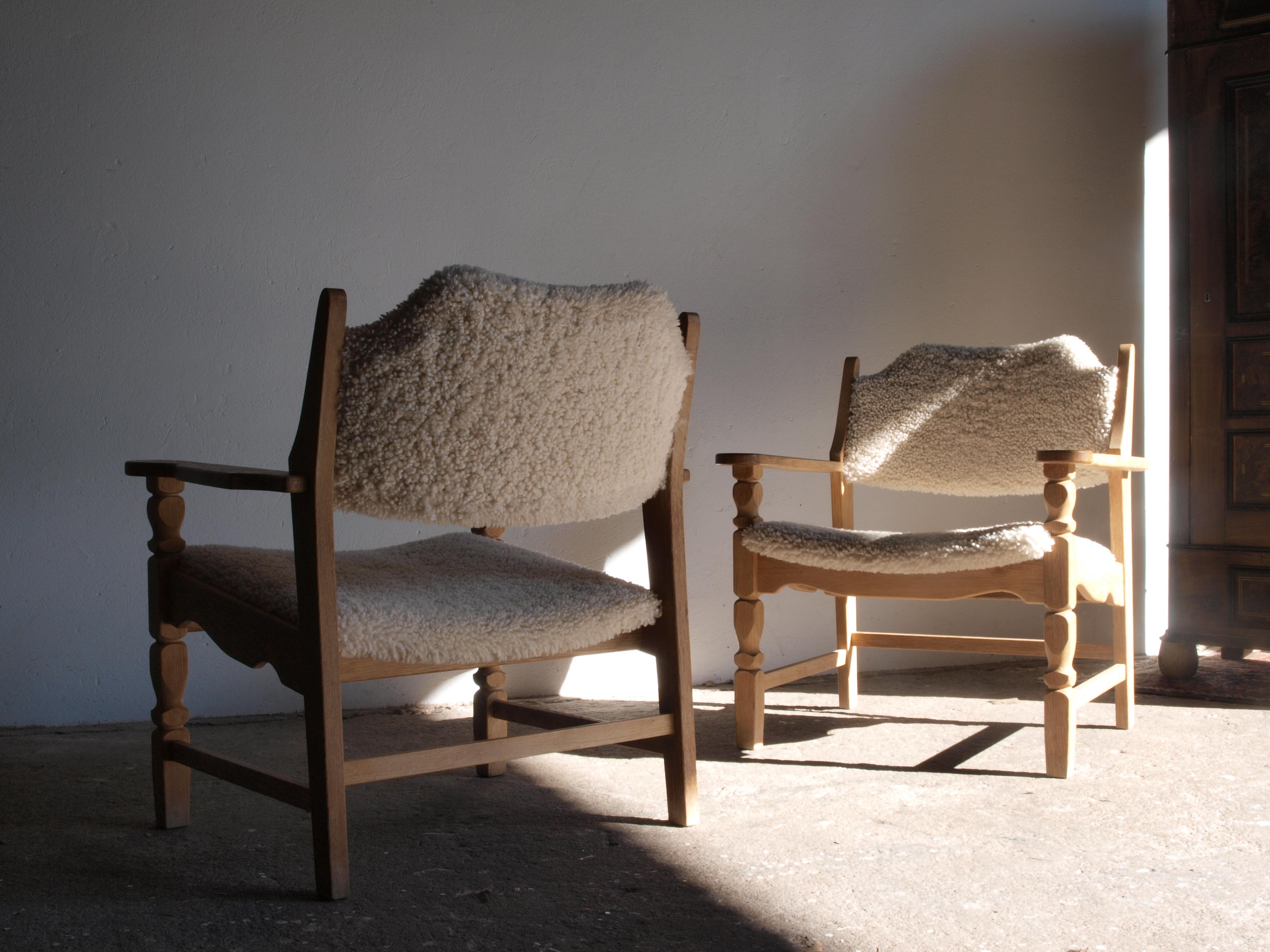 Mid-Century Modern Henning Kjærnulf Danish Sheepskin Lounge Chairs, 1960s, set of 2