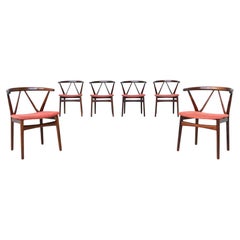 Henning Kjaernulf dining chairs #255 in rosewood Bruno Hansen Denmark 1960