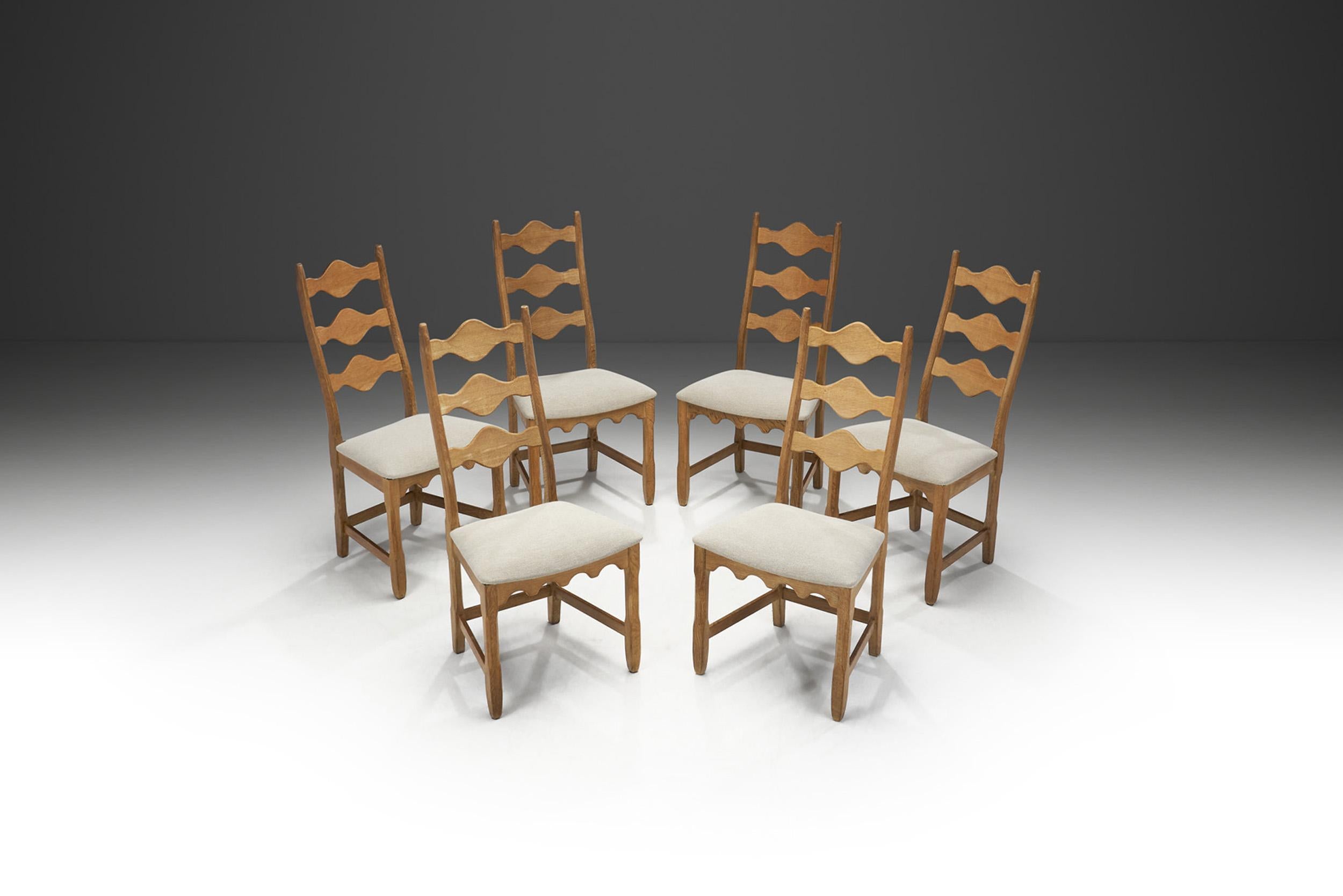 Henning Kjaernulf dining chairs for Nyrup Møbelfabrik, Denmark 1950s

This impressive mid-century dining set of six is representative of the fundamental axioms of Scandinavian design that revolve around quality and functionality and pairs it with