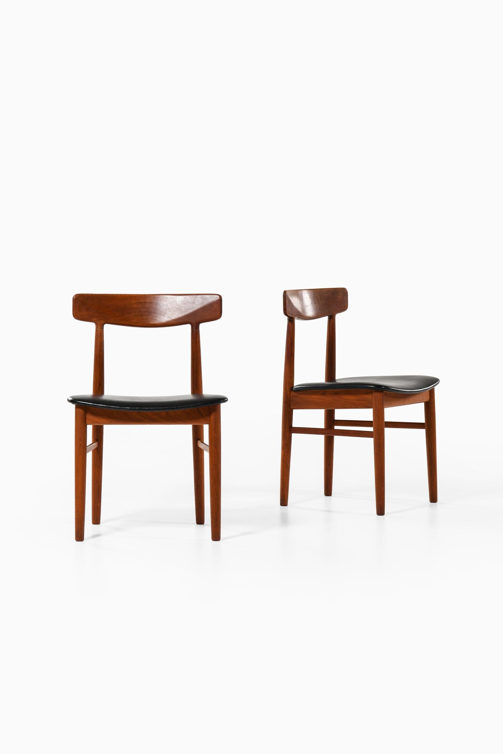 A set of 6 dining chairs designed by Henning Kjærnulf. Produced by Bruno Hansen in Denmark.