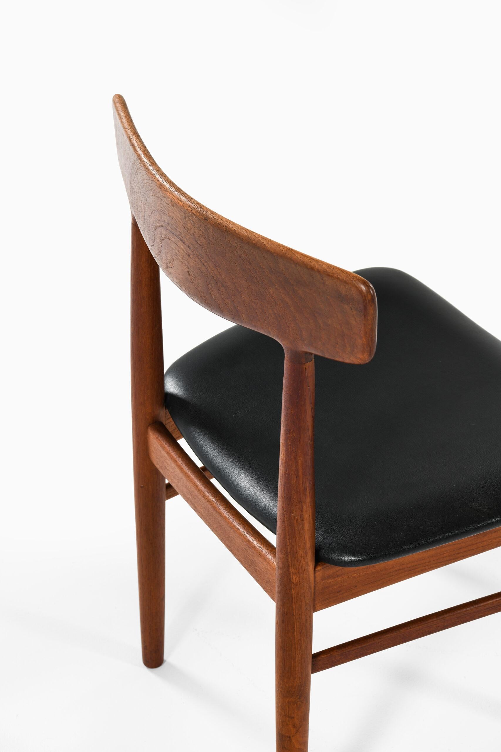 Scandinavian Modern Henning Kjærnulf Dining Chairs Produced by Bruno Hansen in Denmark