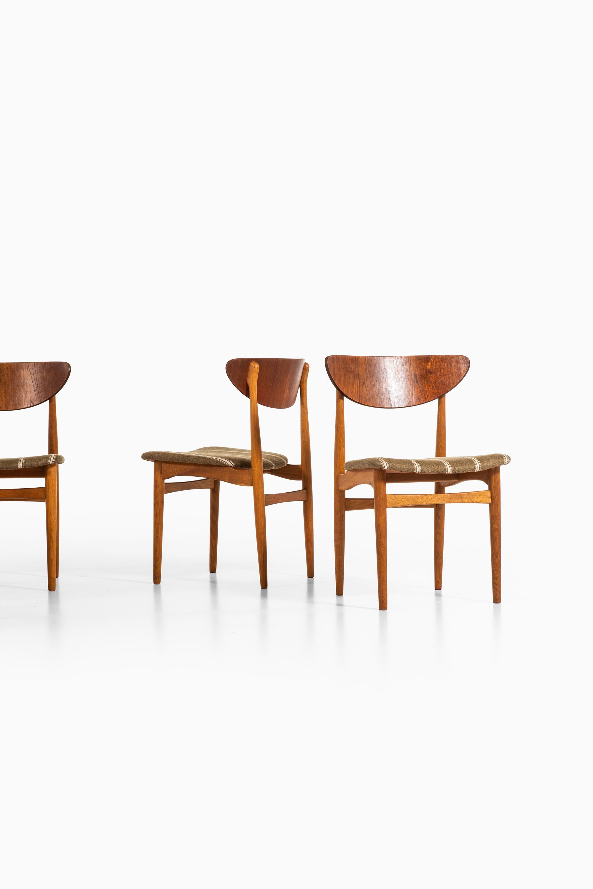 Rare set of 12 dining chairs designed by Henning Kjærnulf. Produced by Sorø Stolefabrik in Denmark.