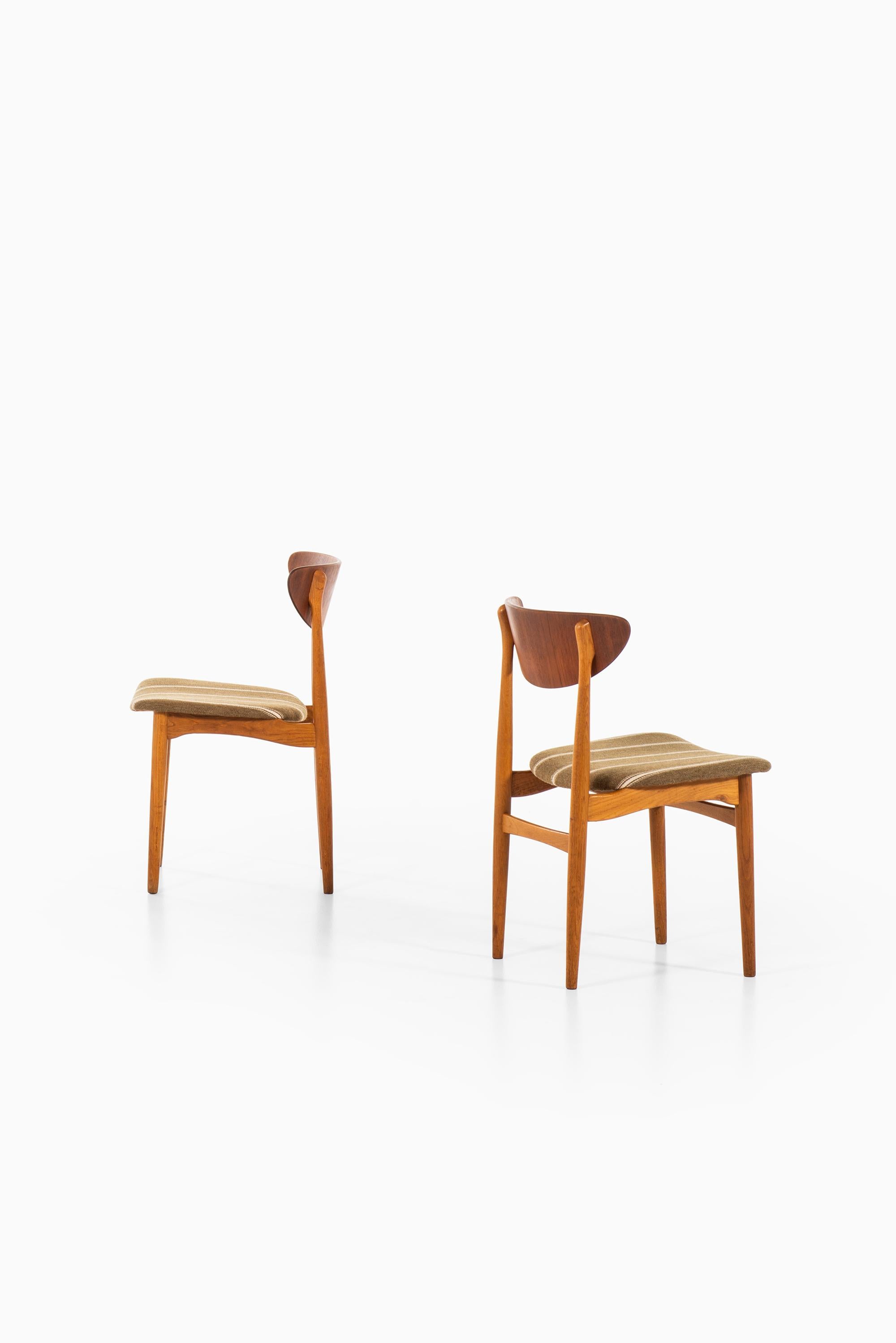 Wool Henning Kjærnulf Dining Chairs Produced by Sorø Stolefabrik in Denmark