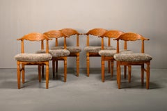 Henning Kjærnulf dining chairs set in Oak and Lambswool, Denmark, 1960s