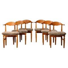 Henning Kjærnulf dining chairs set in Oak and Lambswool, Denmark, 1960s